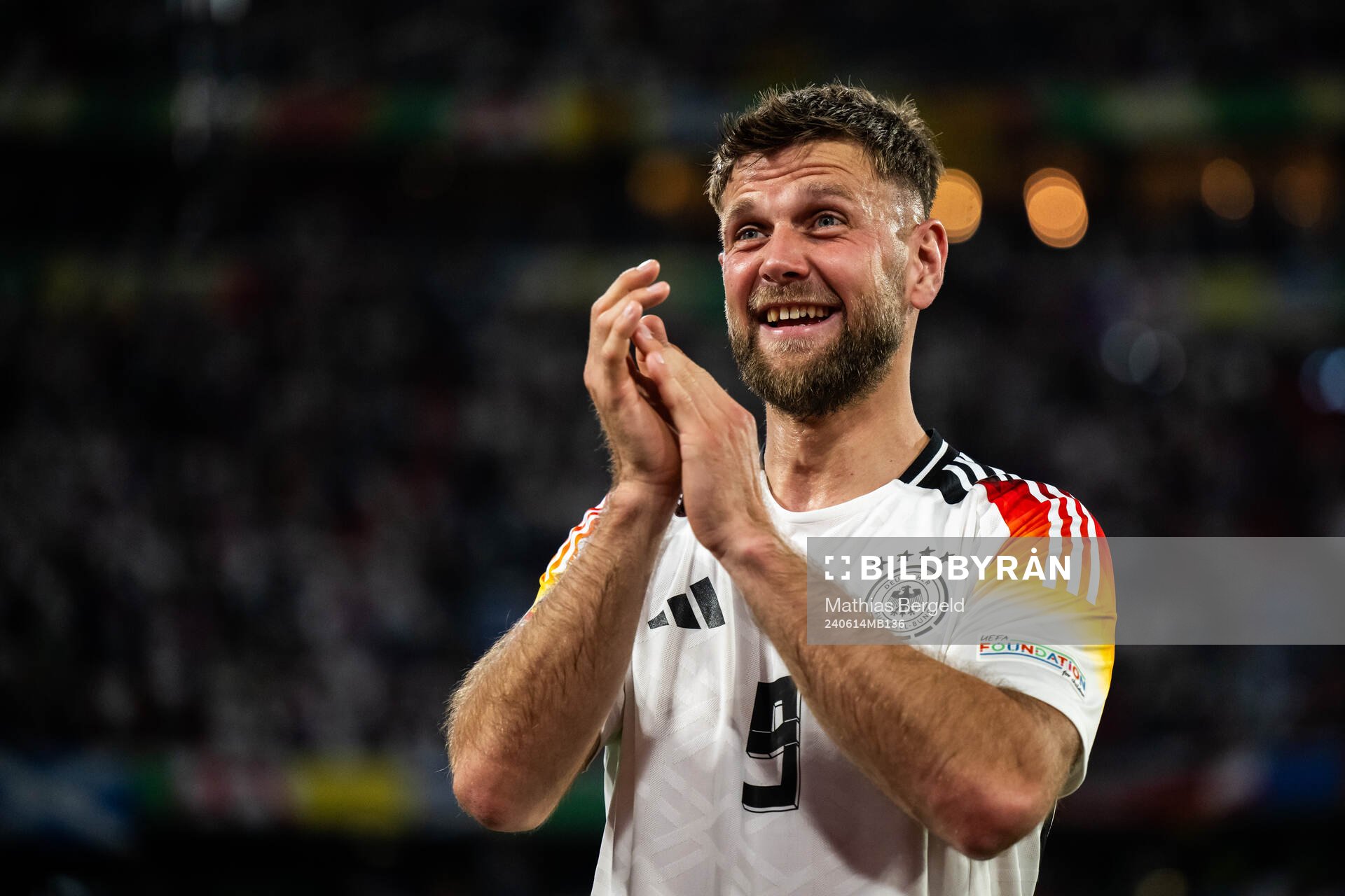 Niclas Füllkrug of Germany celebrates