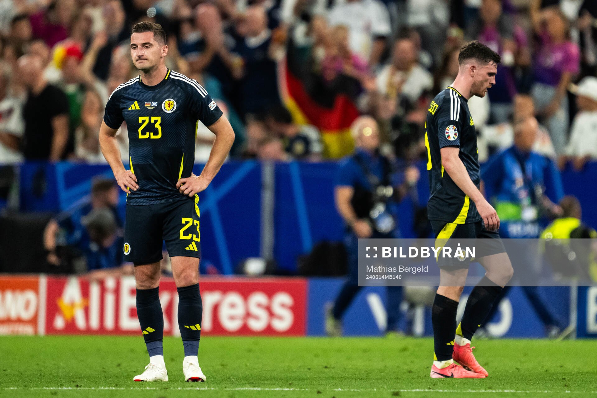Kenny McLean and Kieran Tierney of Scotland looks dejected