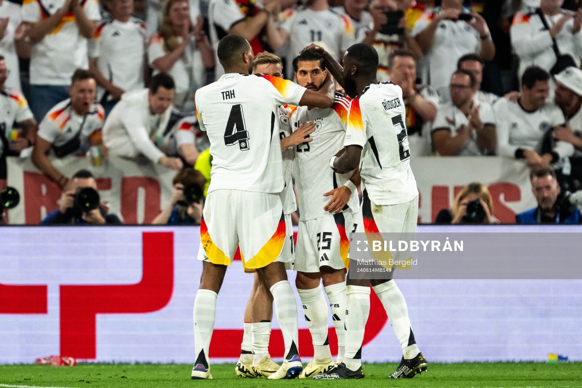 Emre Can of Germany celebrate with teammates