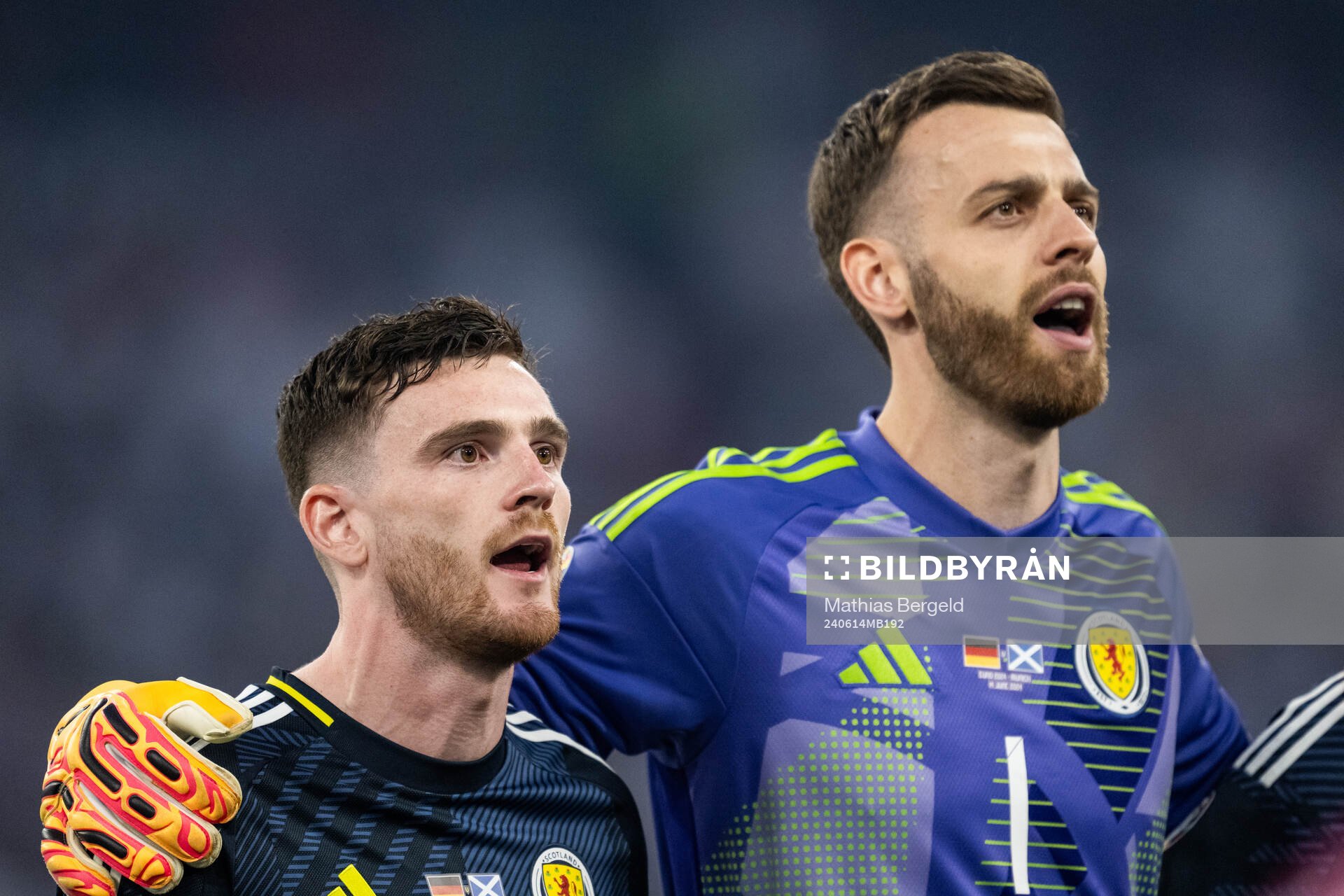 Andrew Robertson and goalkeeper Angus Gunn of Scotland