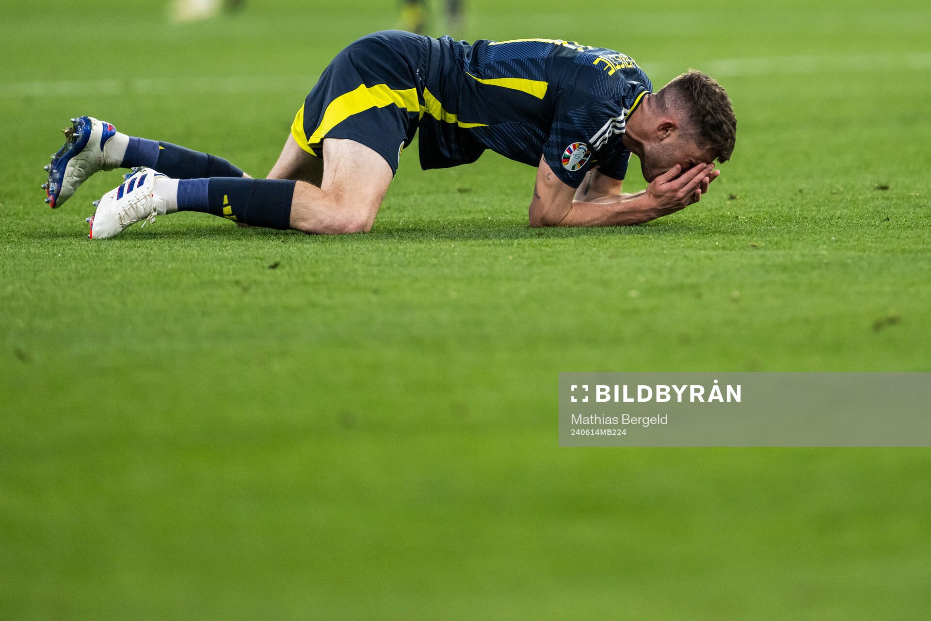 Ryan Christie of Scotland in pain