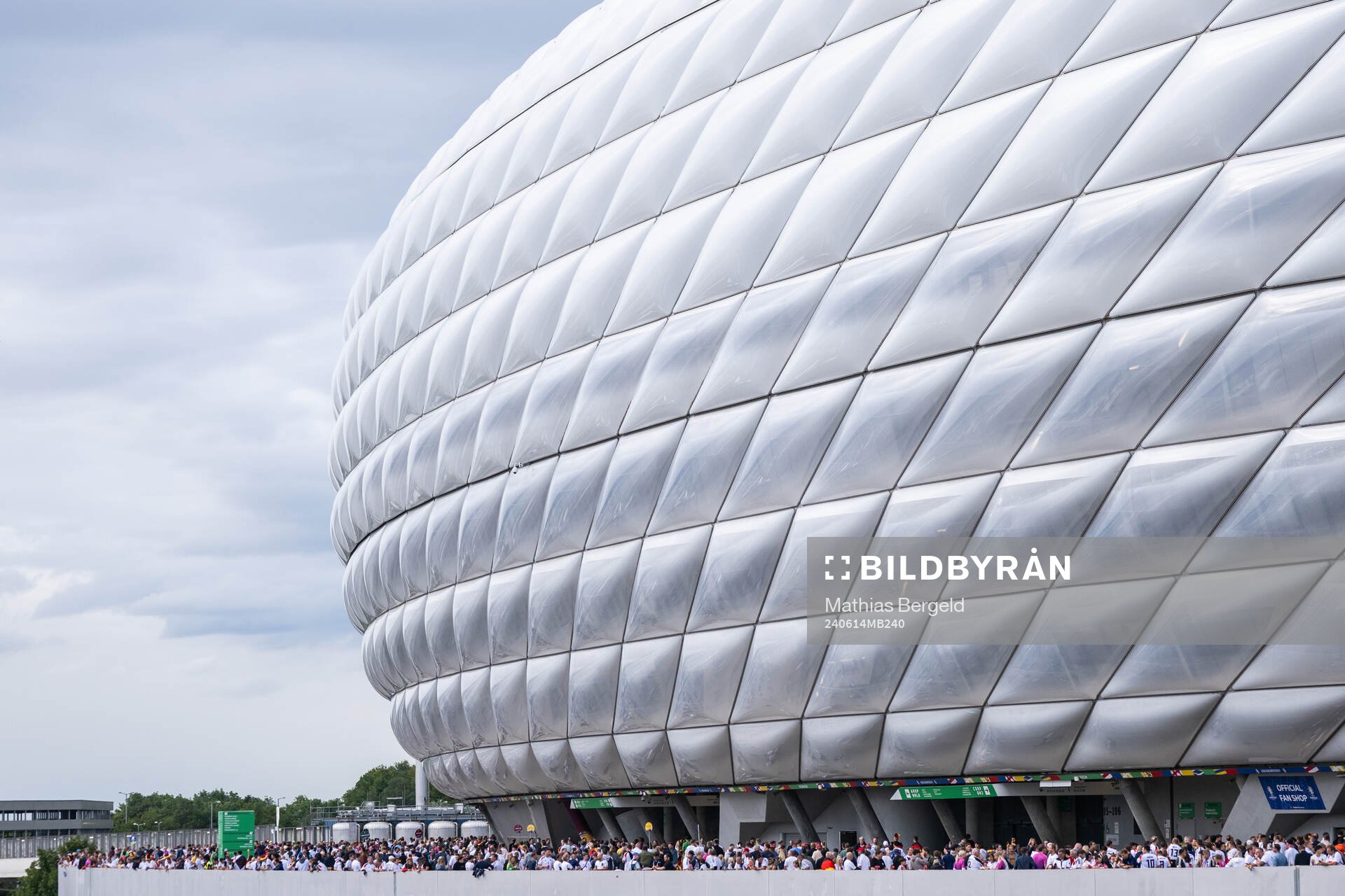Spectators outside Munich Football Arena