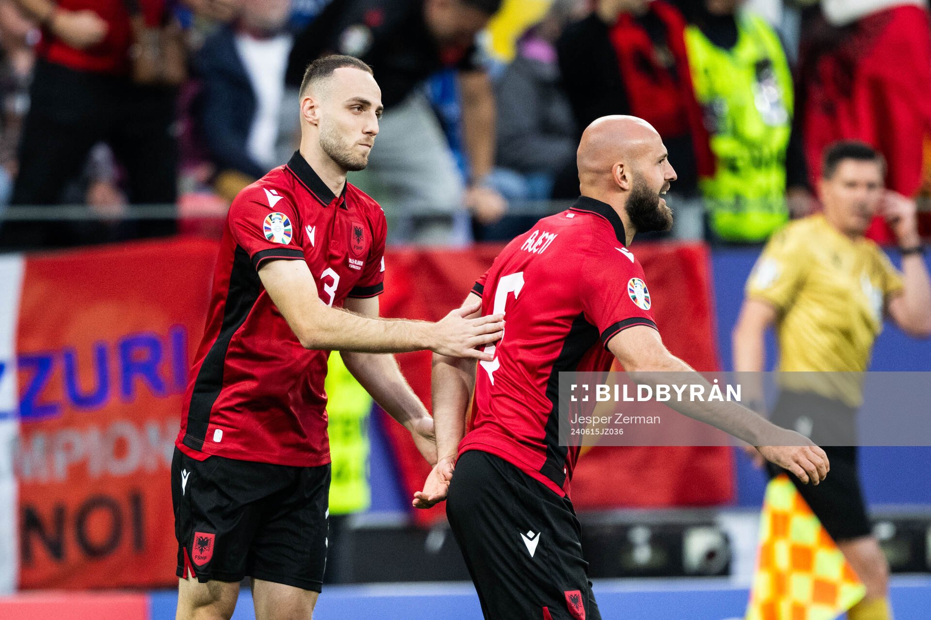 Mario Mitaj and Arlind Ajeti of Albania celebrate