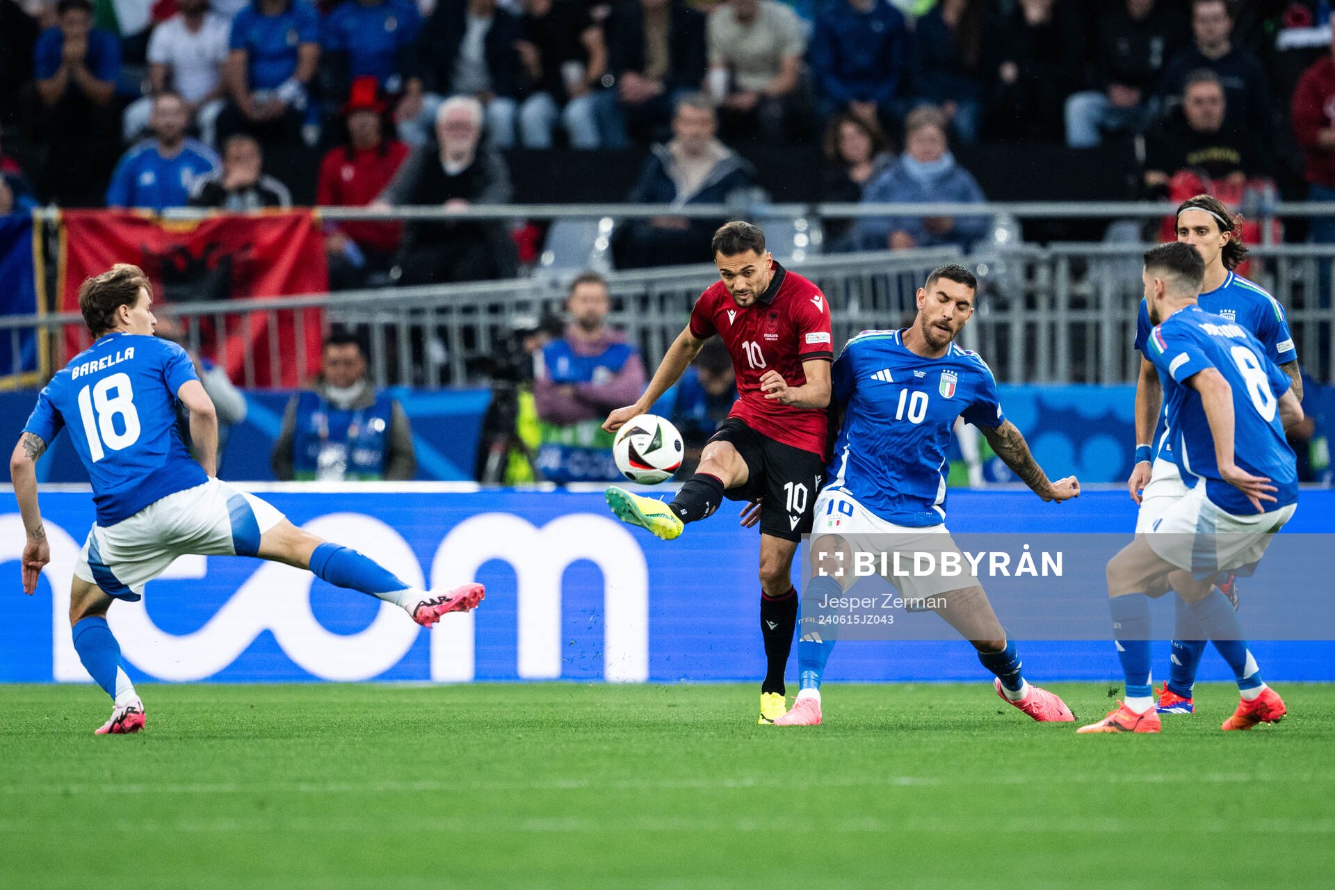 Nedim Bajrami of Albania and Lorenzo Pellegrini of Italy