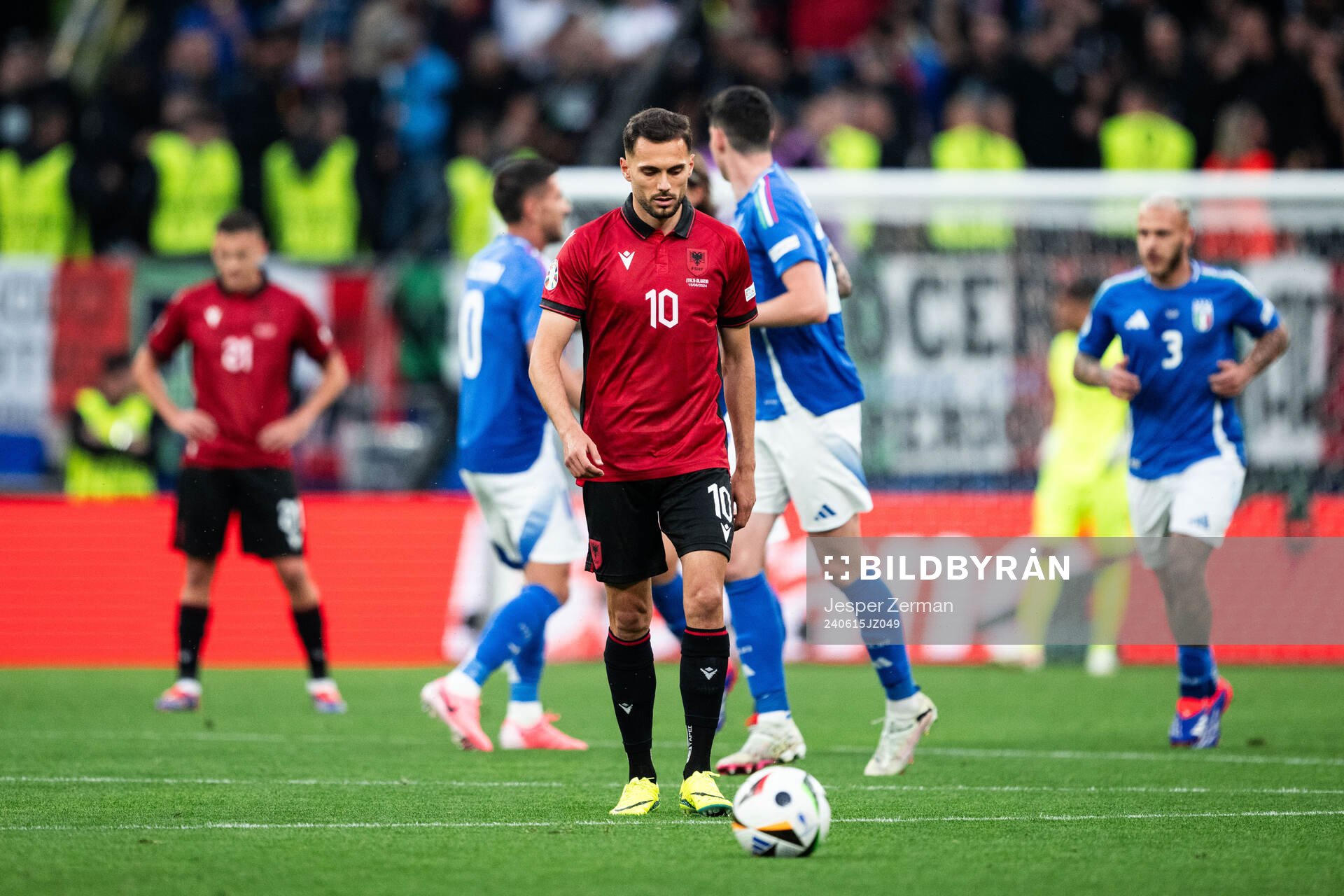 Nedim Bajrami of Albania looks dejected