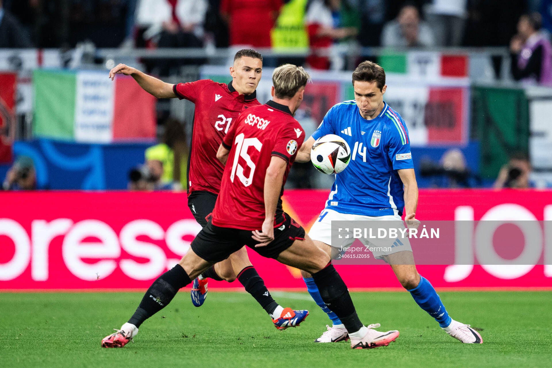 Kristjan Asllani of Albania and Federico Chiesa of Italy