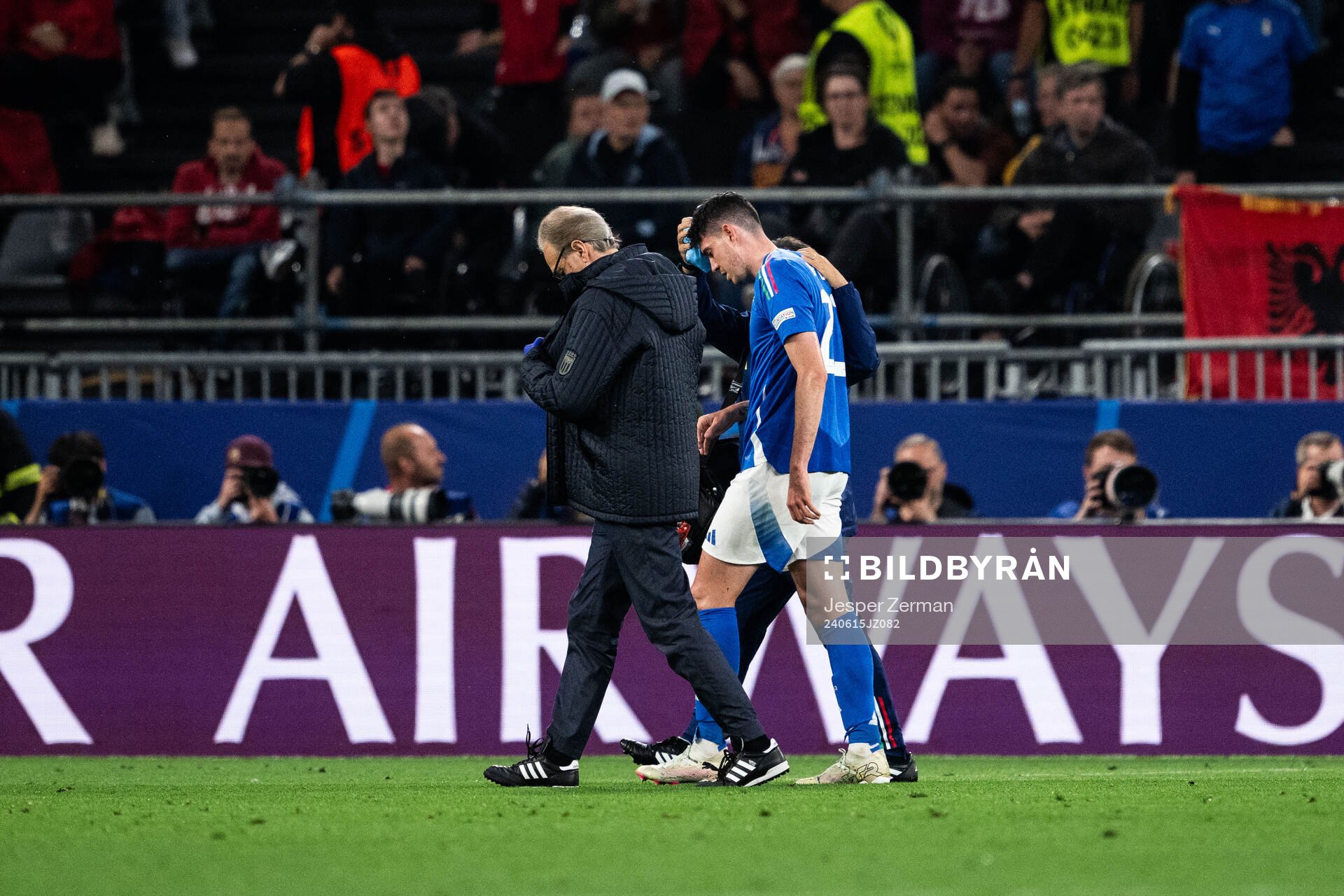Alessandro Bastoni of Italy in pain