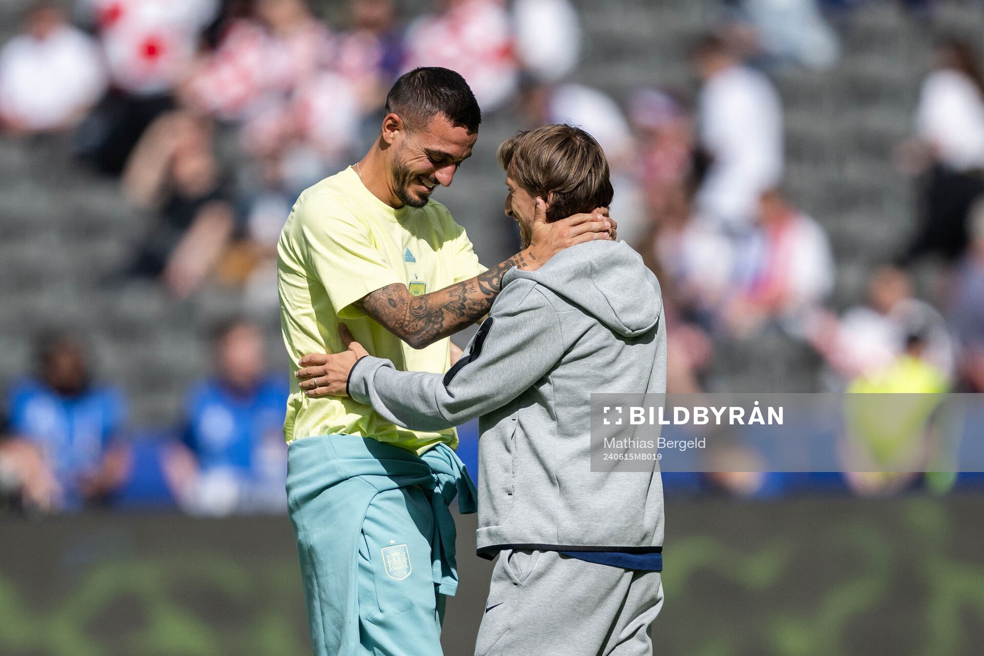 Joselu of Spain and Luka Modric of Croatia