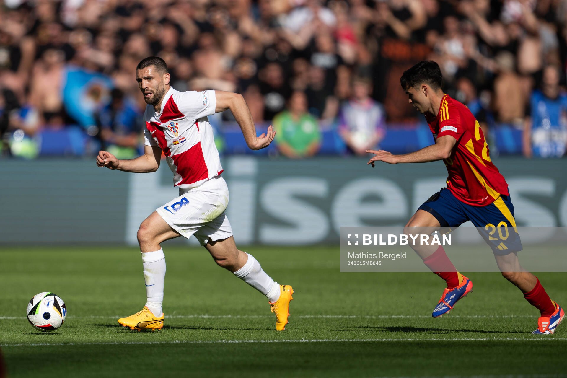 Mateo Kovacic of Croatia and Pedri of Spain during the UEFA Euro 2024 Football Championship match between Spain and Croatia on June 15, 2024 in Berlin.