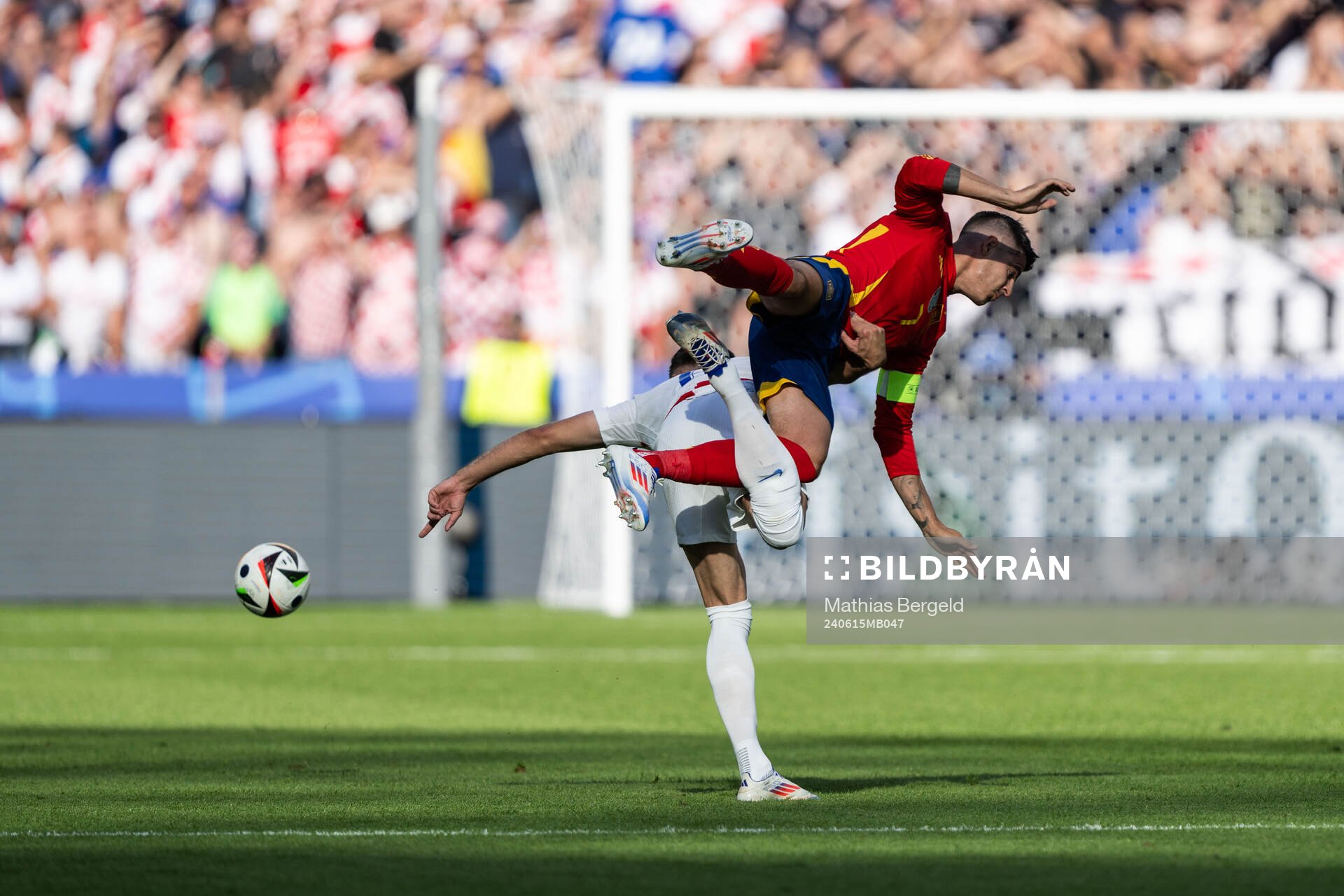 Josip Sutalo of Croatia and Alvaro Morata of Spain