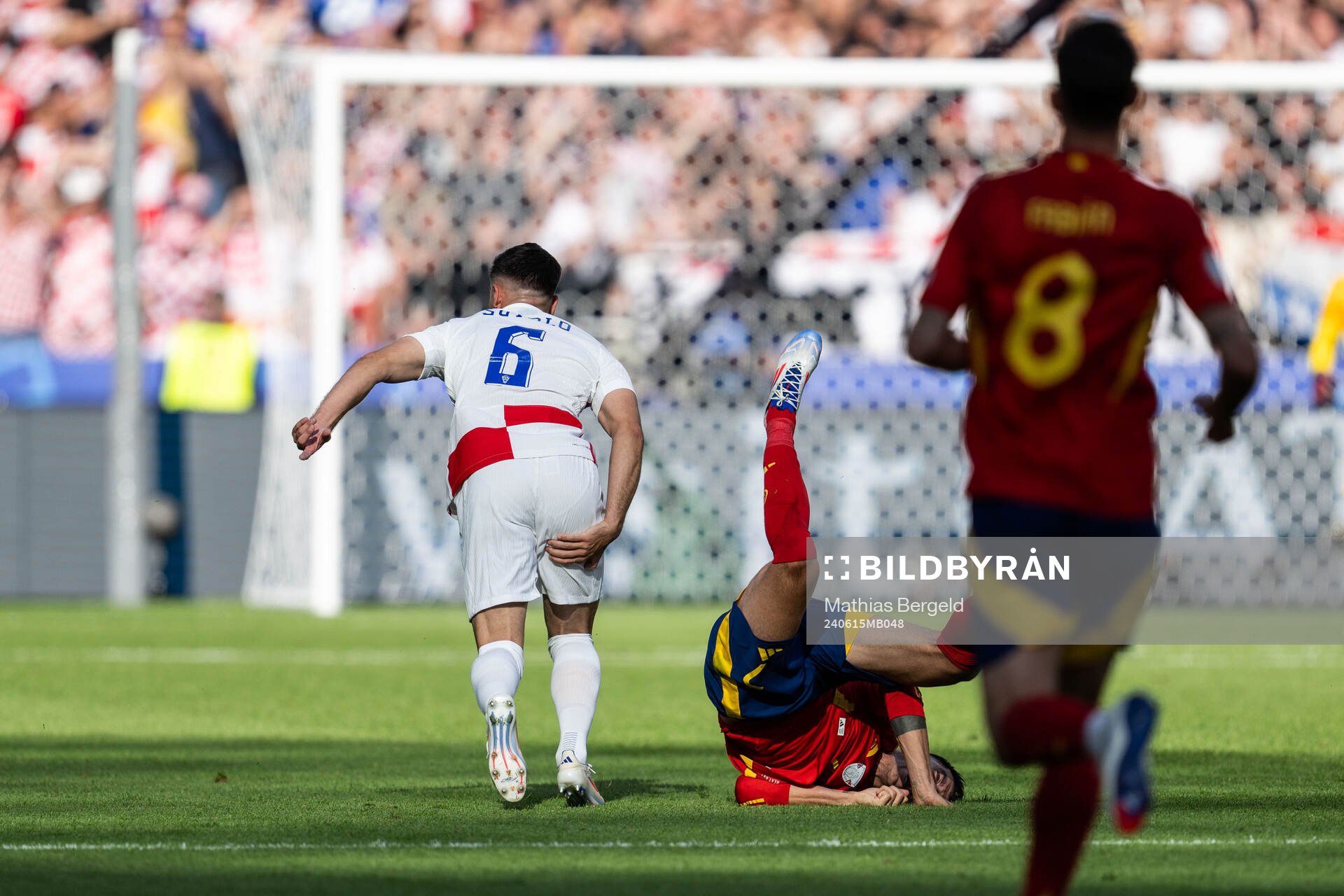 Josip Sutalo of Croatia and Alvaro Morata of Spain