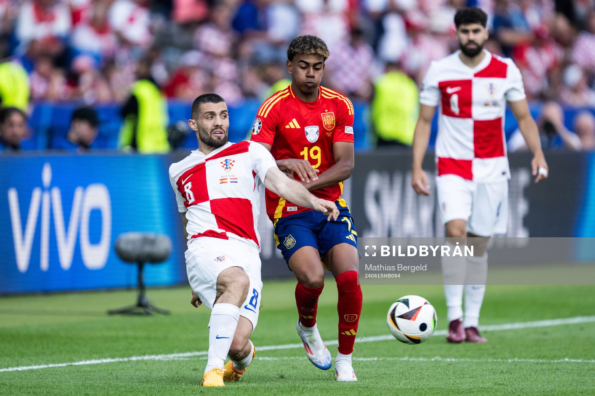 Mateo Kovacic of Croatia and Lamine Yamal of Spain during the UEFA Euro 2024 Football Championship match between Spain and Croatia on June 15, 2024 in Berlin.