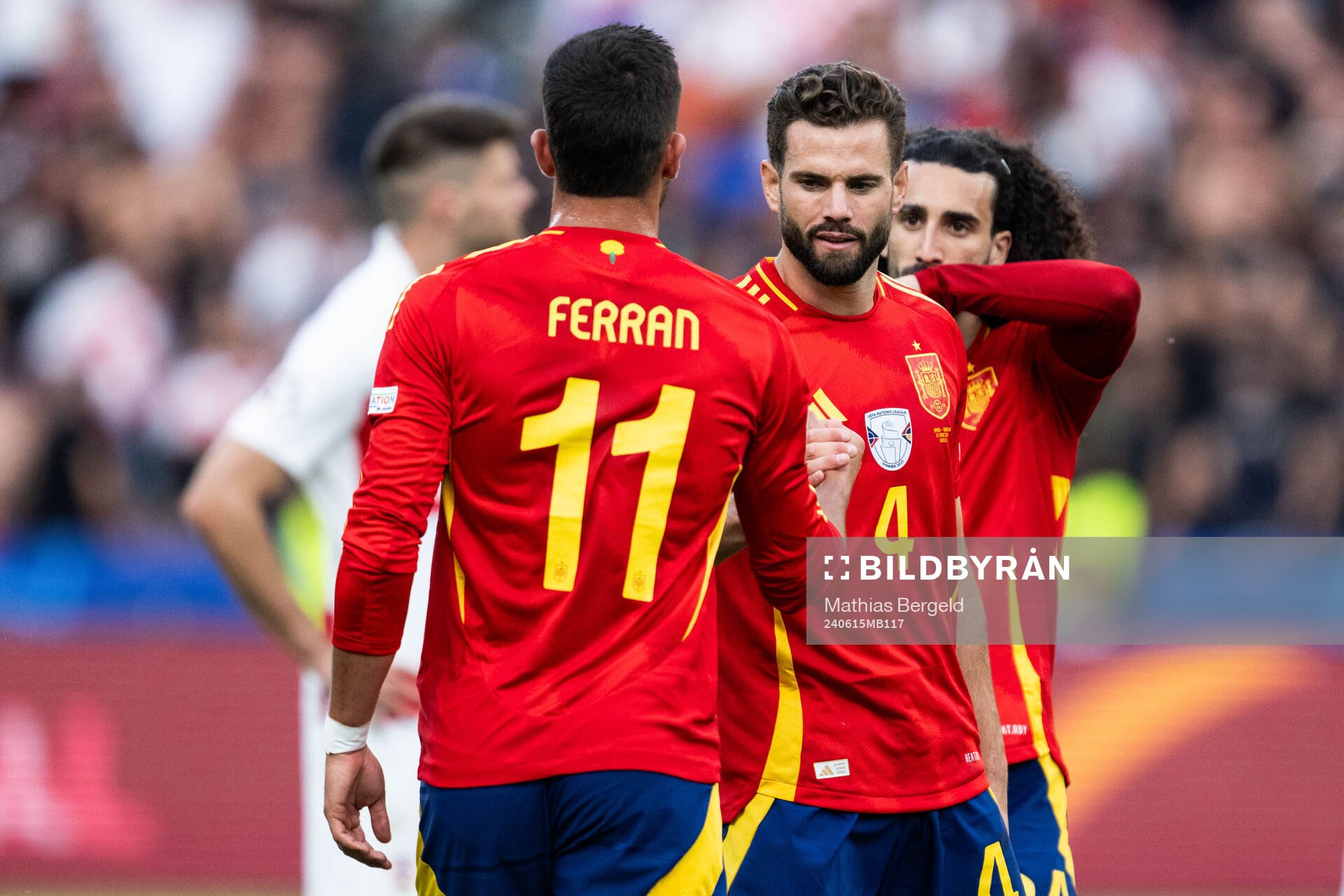 Ferran Torres and Nacho of Spain celebrate