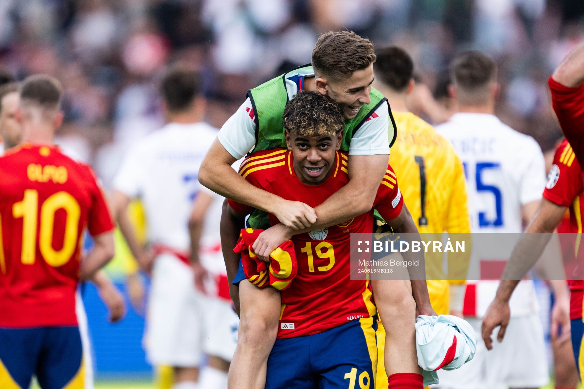 Lamine Yamal and Fermin Lopez Marin of Spain celebrate