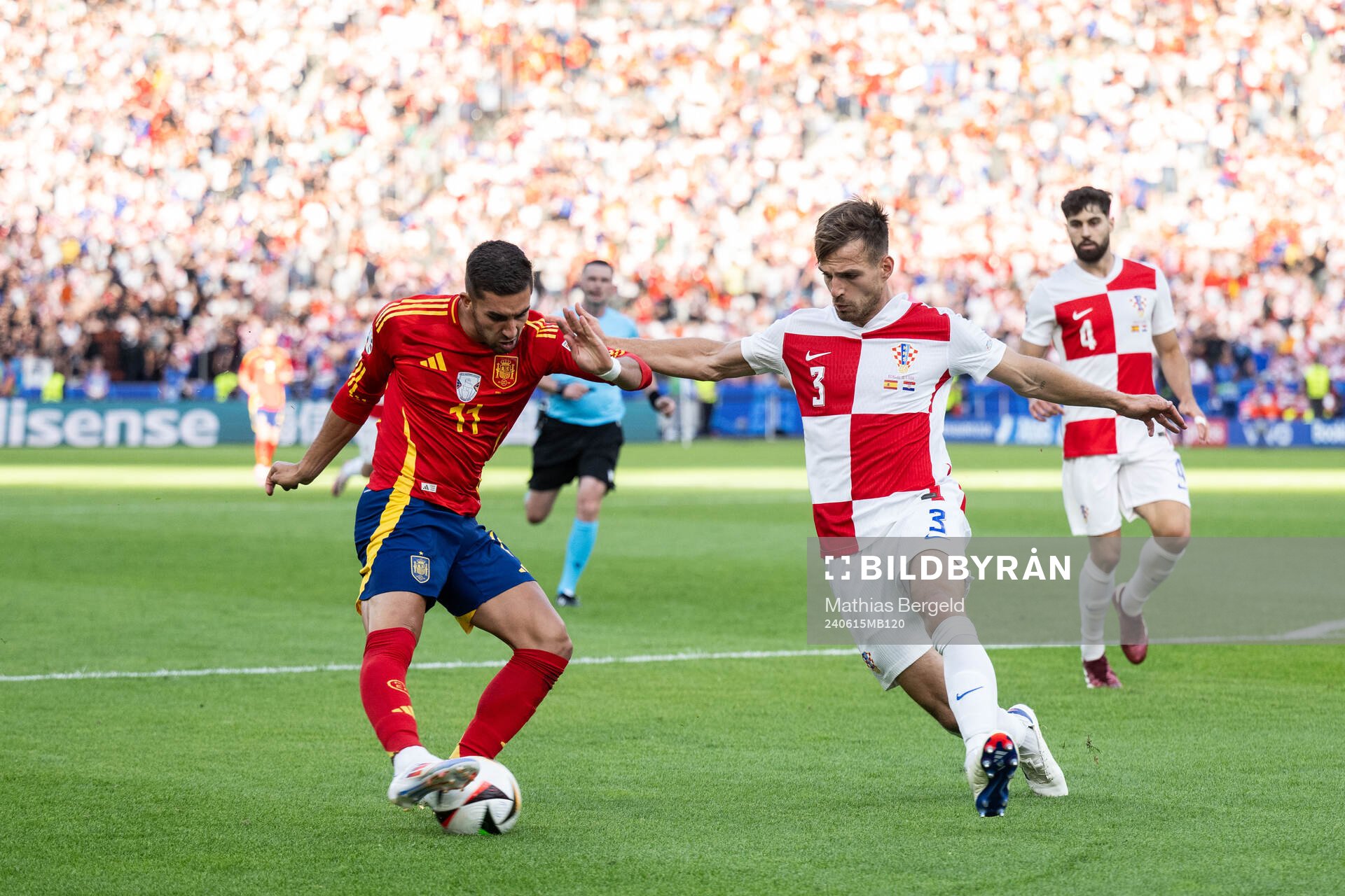 Ferran Torres of Spain and Marin Pongracic of Croatia