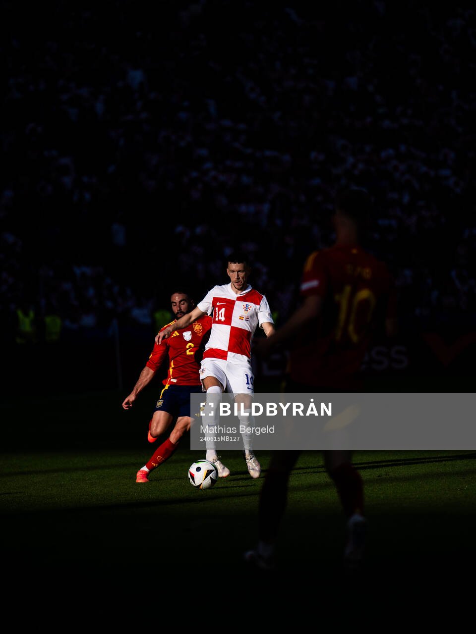 Daniel Carvajal of Spain and Ivan Perisic of Croatia