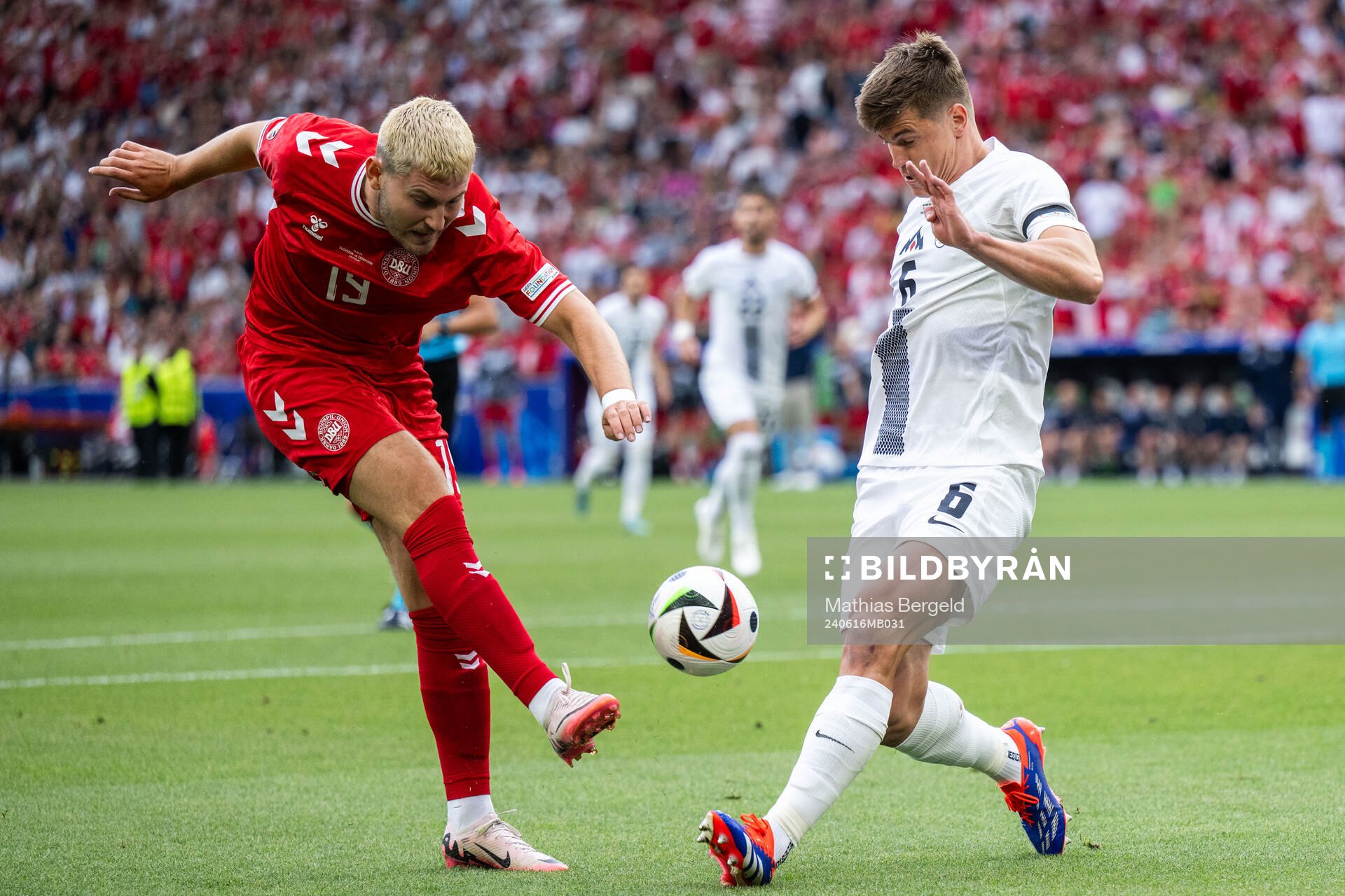 Jonas Wind of Denmark and Jaka Bijol of Slovenia