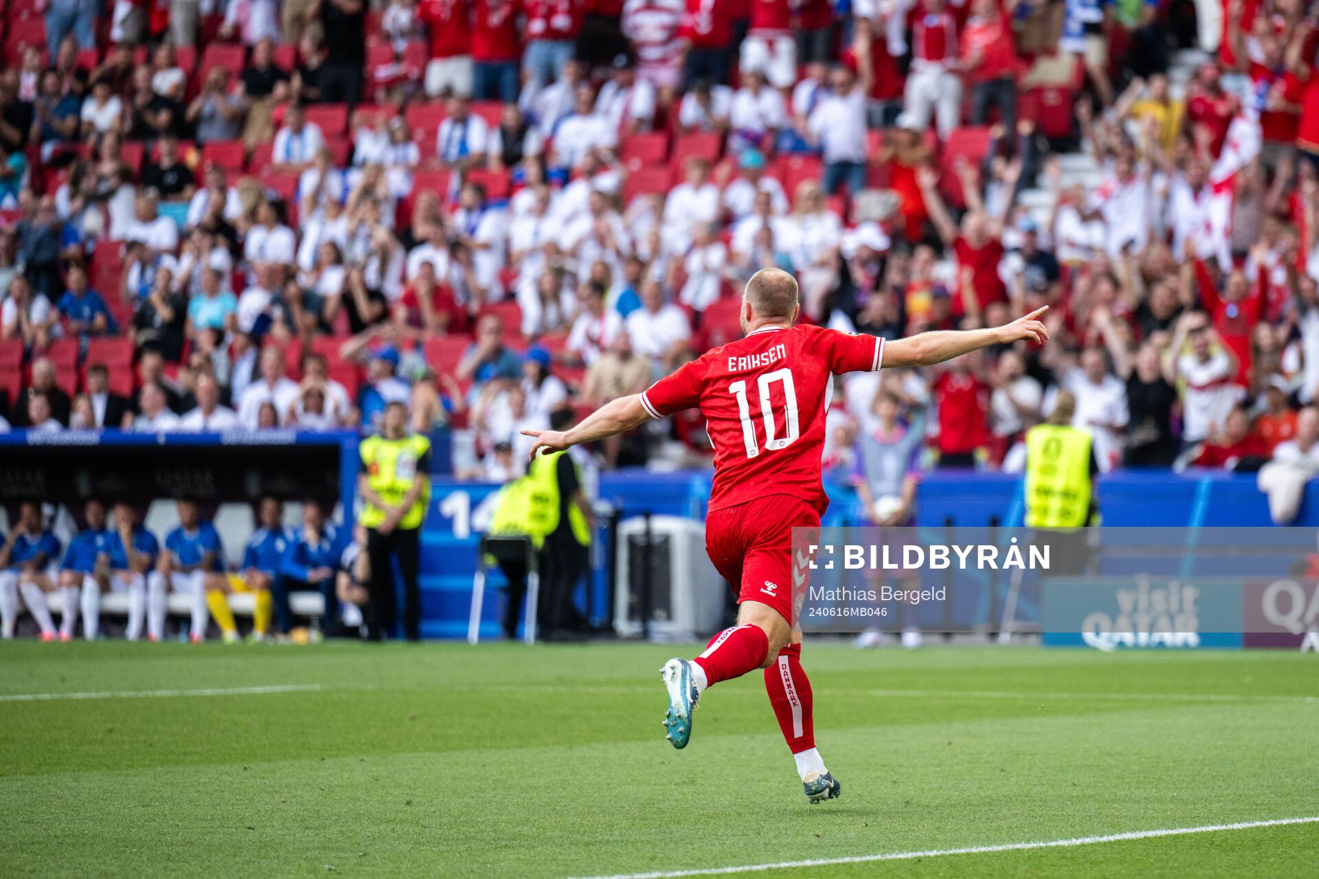 Christian Eriksen of Denmark celebrates