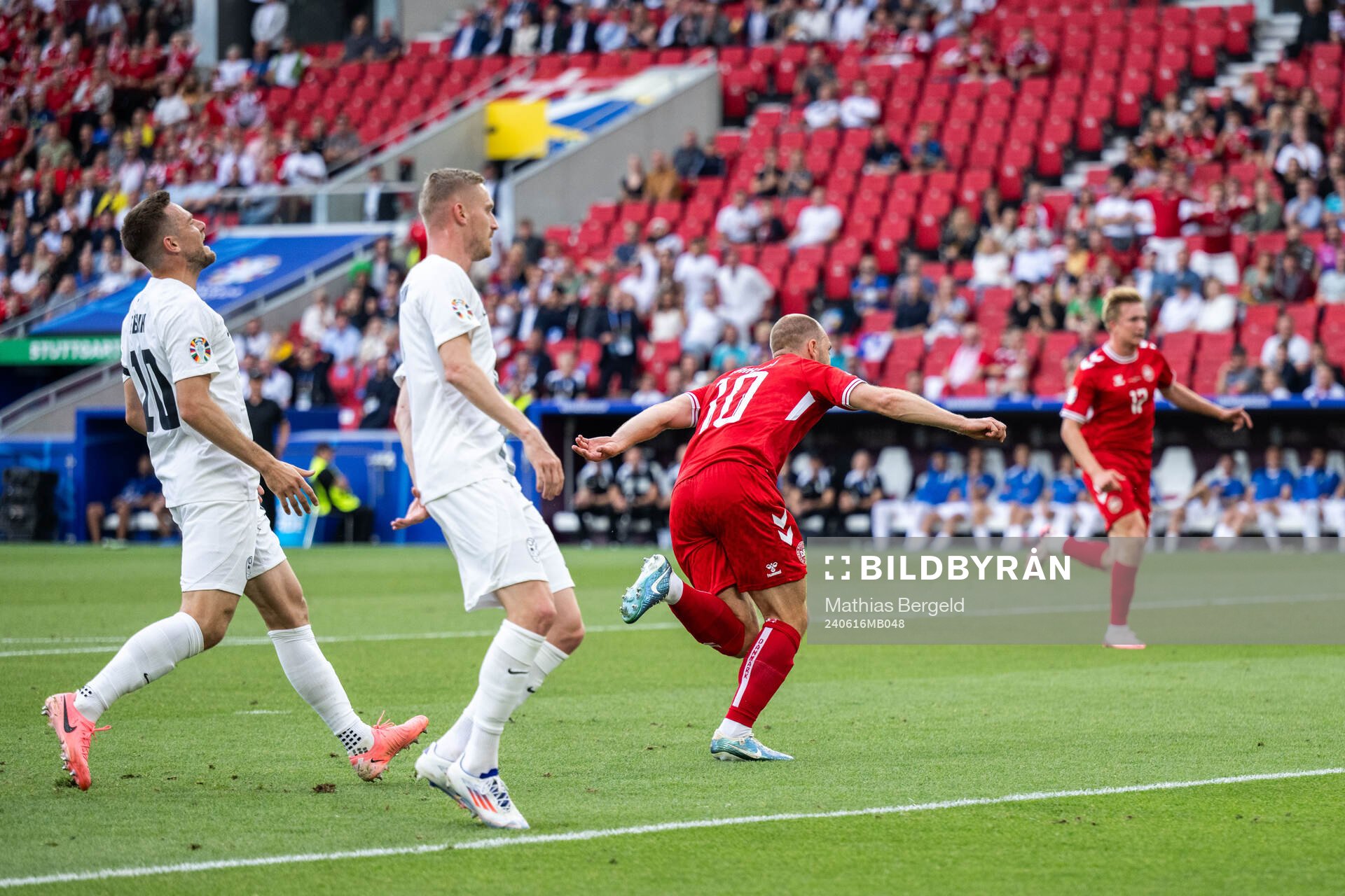 Christian Eriksen of Denmark celebrates