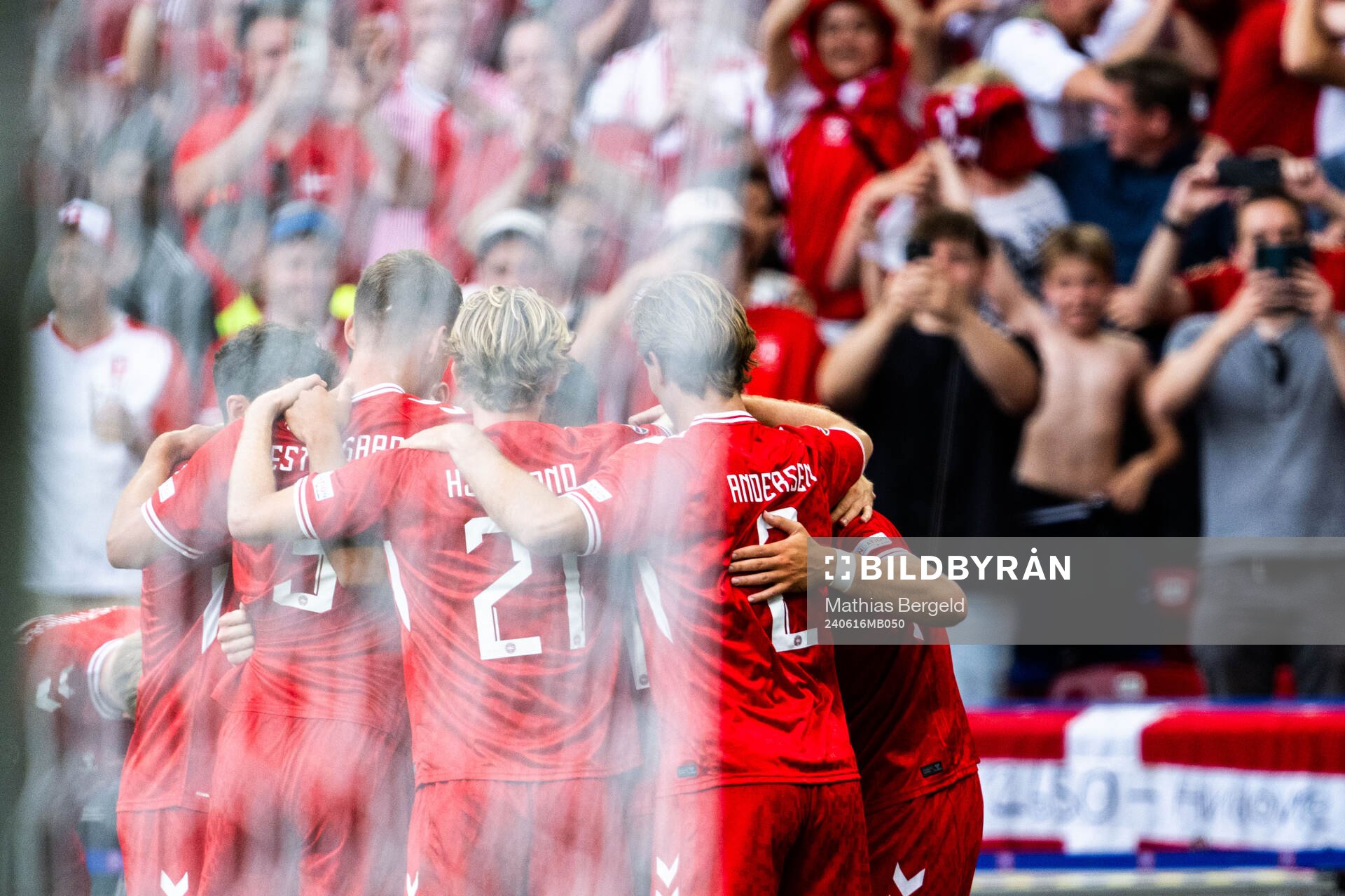 Christian Eriksen of Denmark celebrates with team mates