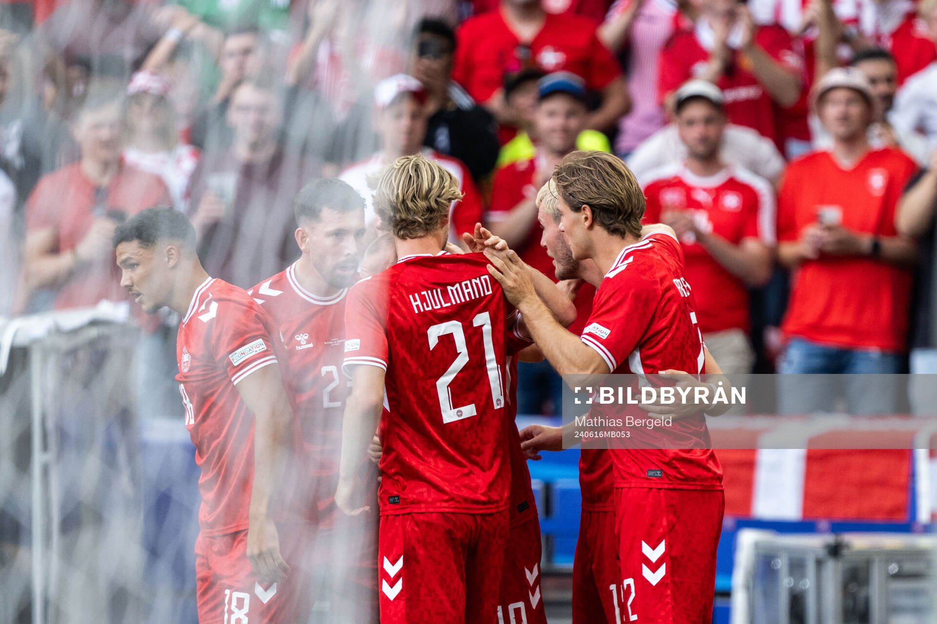 Christian Eriksen of Denmark celebrates with team mates after 0-1 during the UEFA Euro 2024 Football Championship match between Slovenia and Denmark on June 16, 2024 in Stuttgart.
