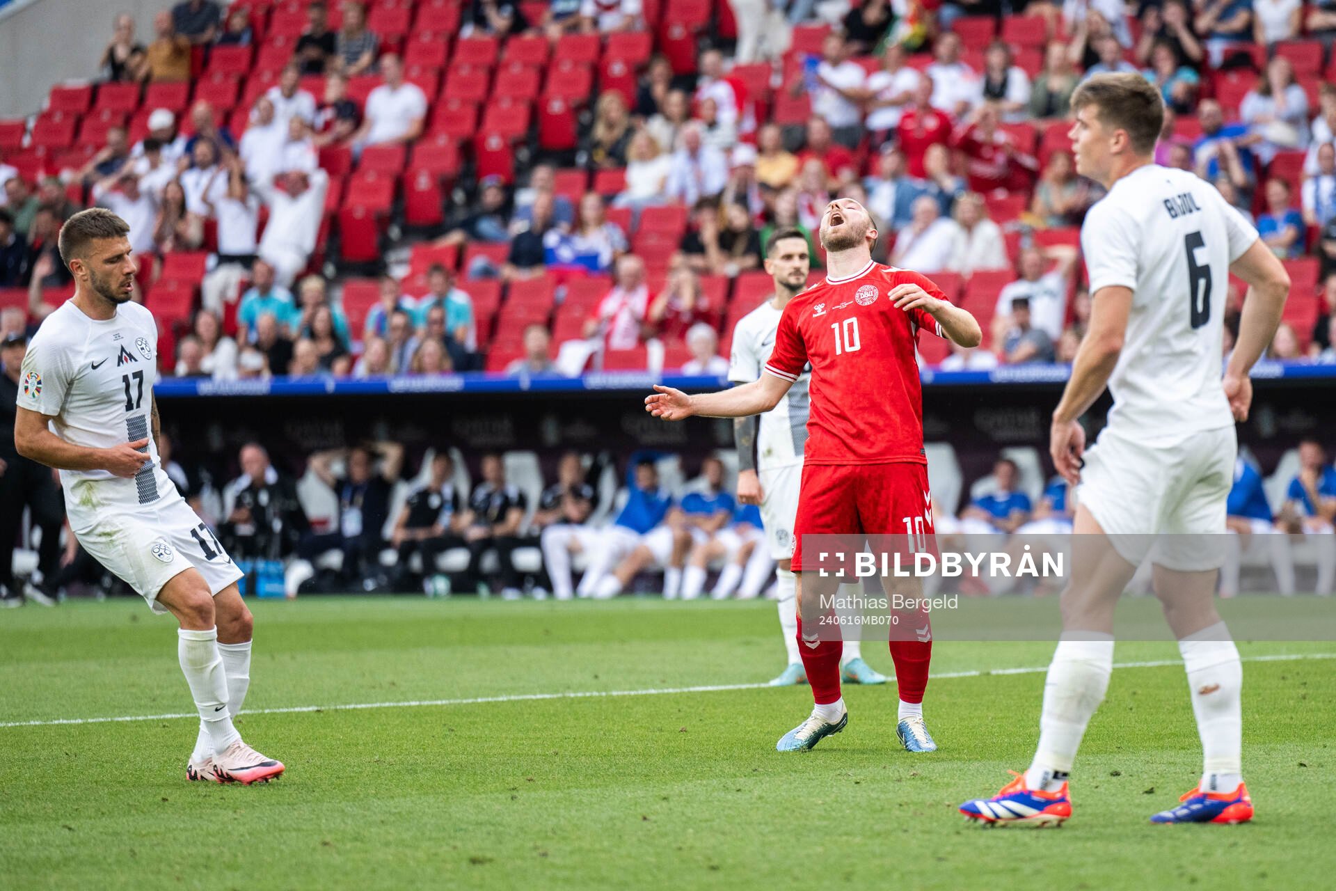 Christian Eriksen of Denmark reacts