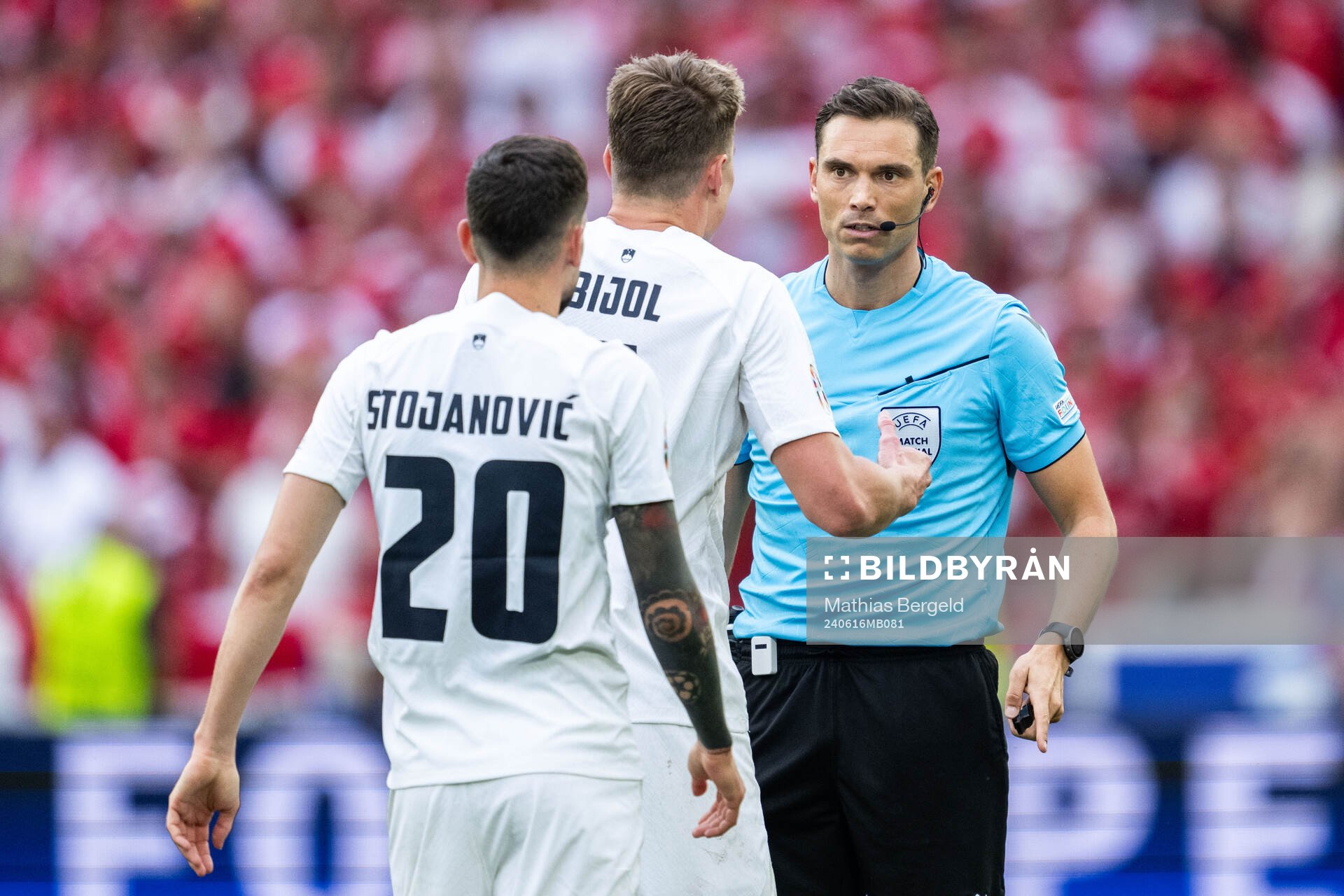 Petar Stojanovic and Jaka Bijol of Slovenia reacts towards