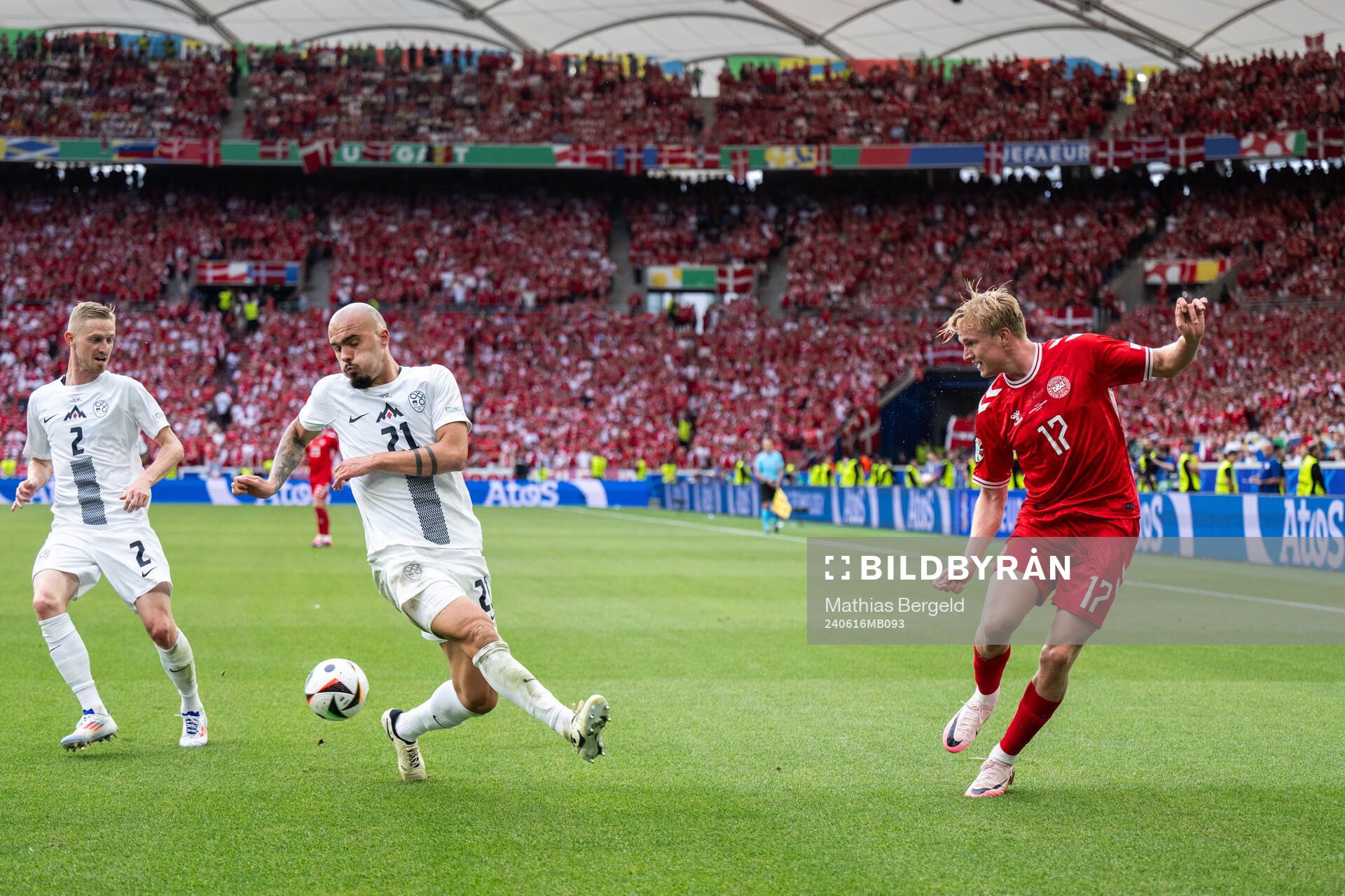 Vanja Drkusic of Slovenia and Victor Kristiansen of Denmark during the UEFA Euro 2024 Football Championship match between Slovenia and Denmark on June 16, 2024 in Stuttgart.