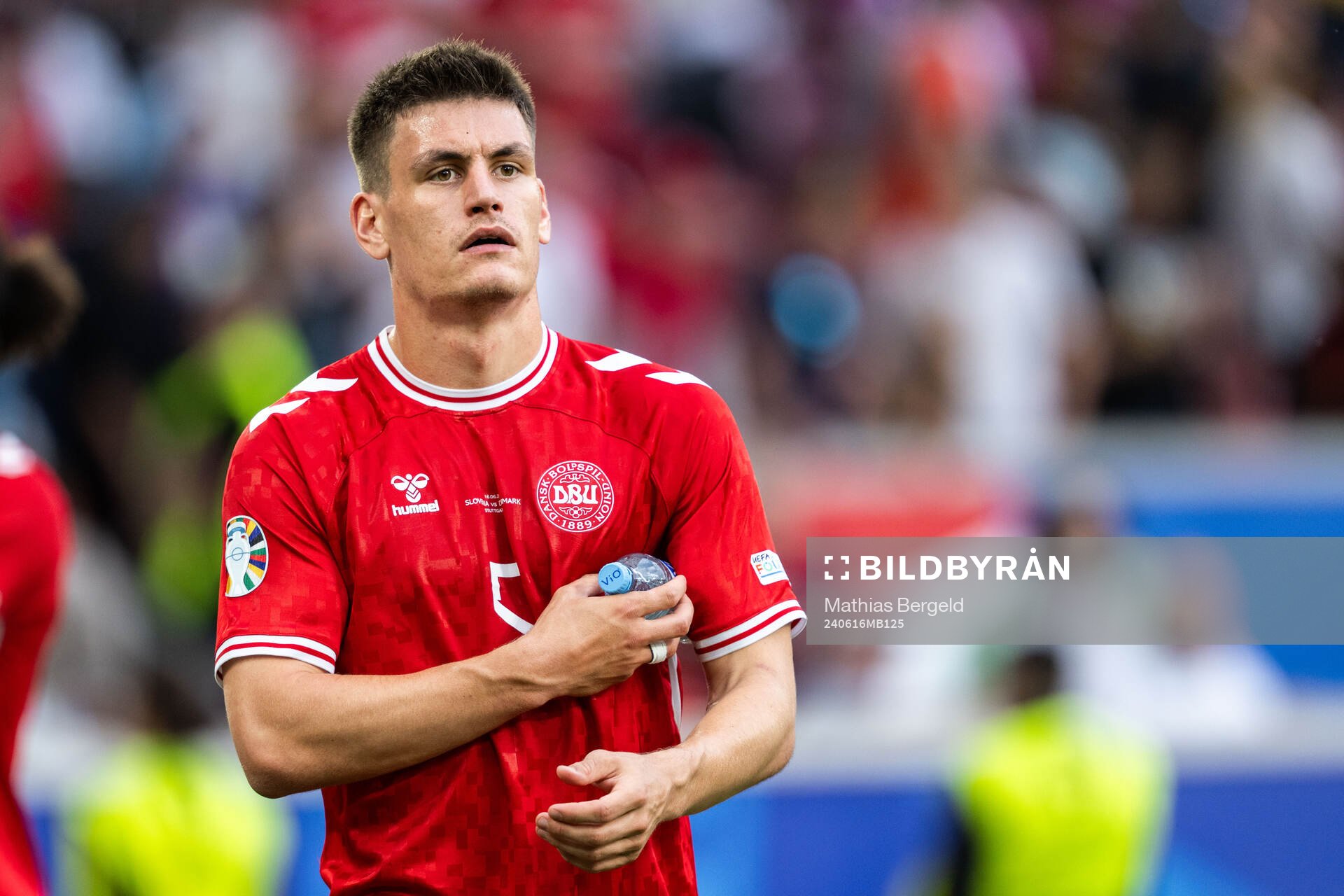 Joakim Mæhle of Denmark looks dejected