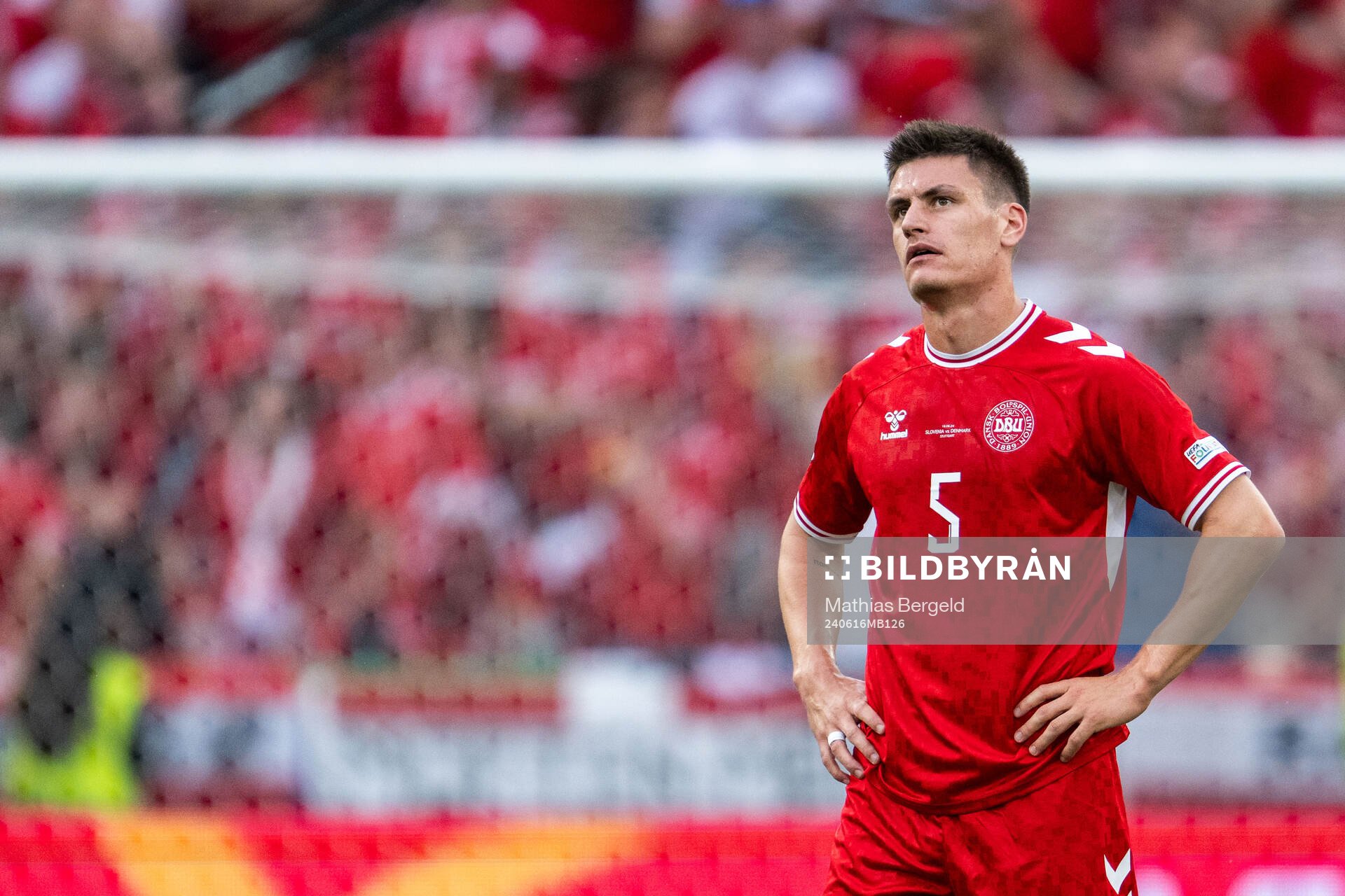 Joakim Mæhle of Denmark looks dejected