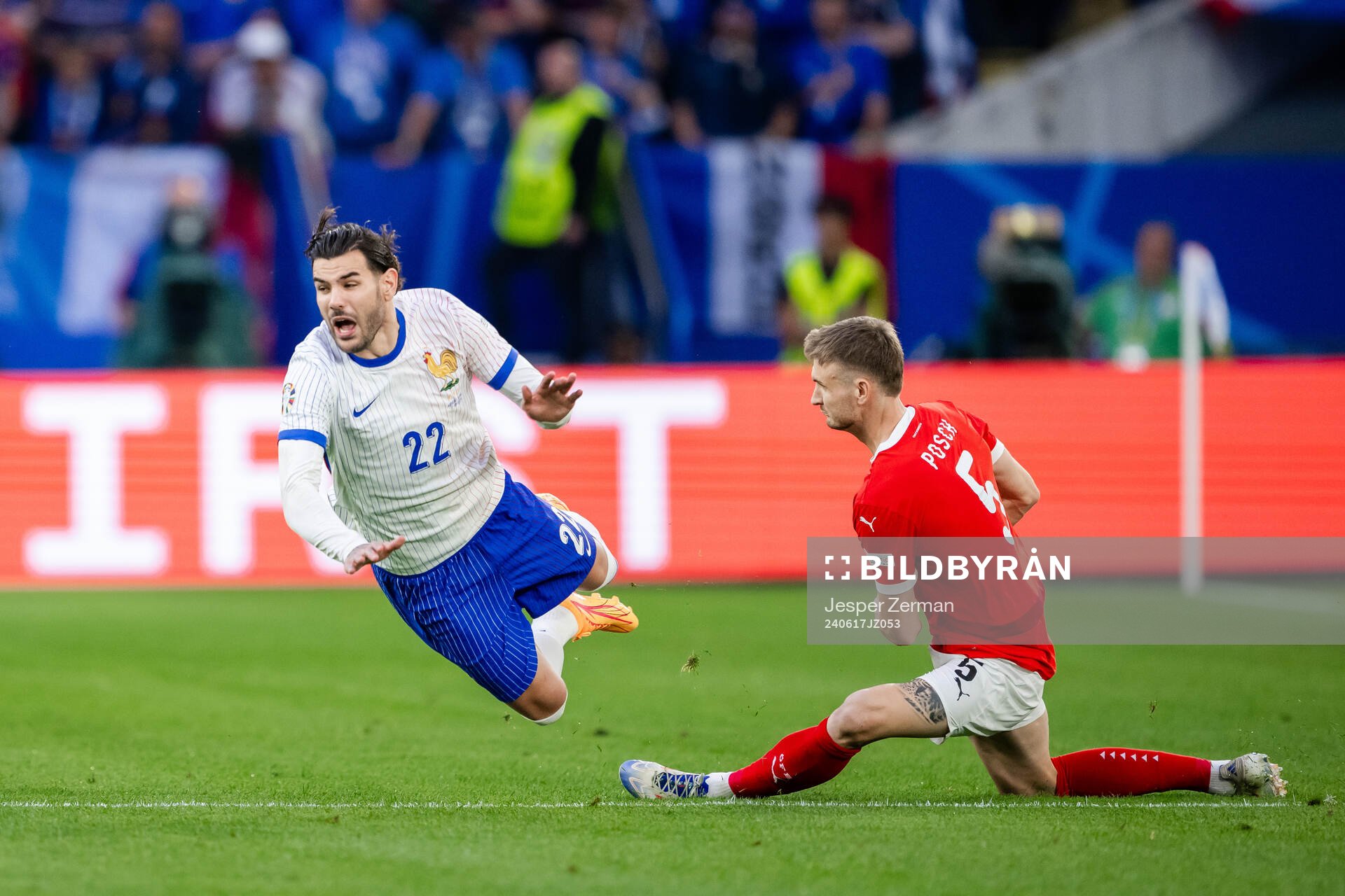 Theo Hernandez of France and Stefan Posch of Austria