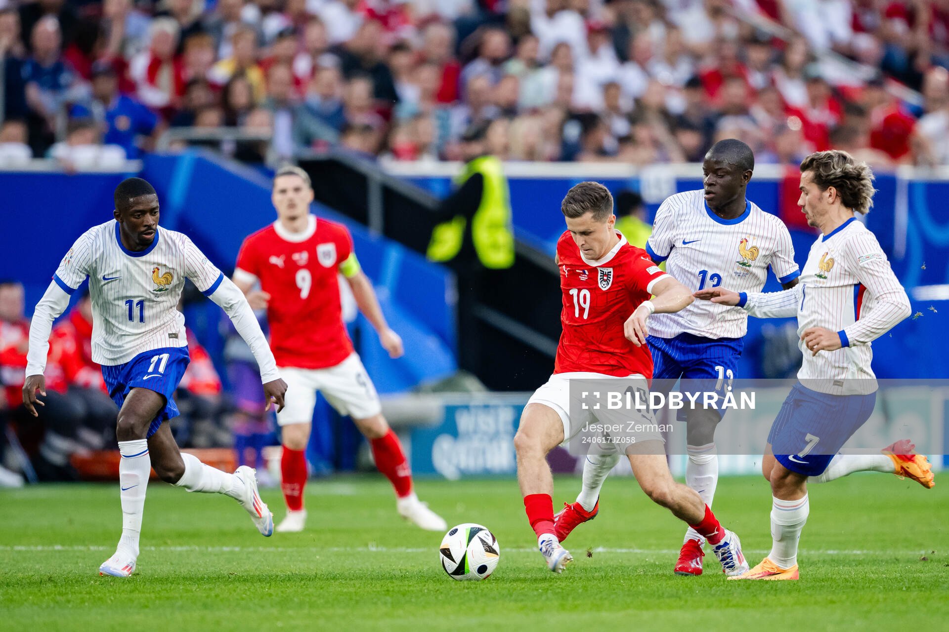 Christoph Baumgartner of Austria against Ousmane Dembele ,