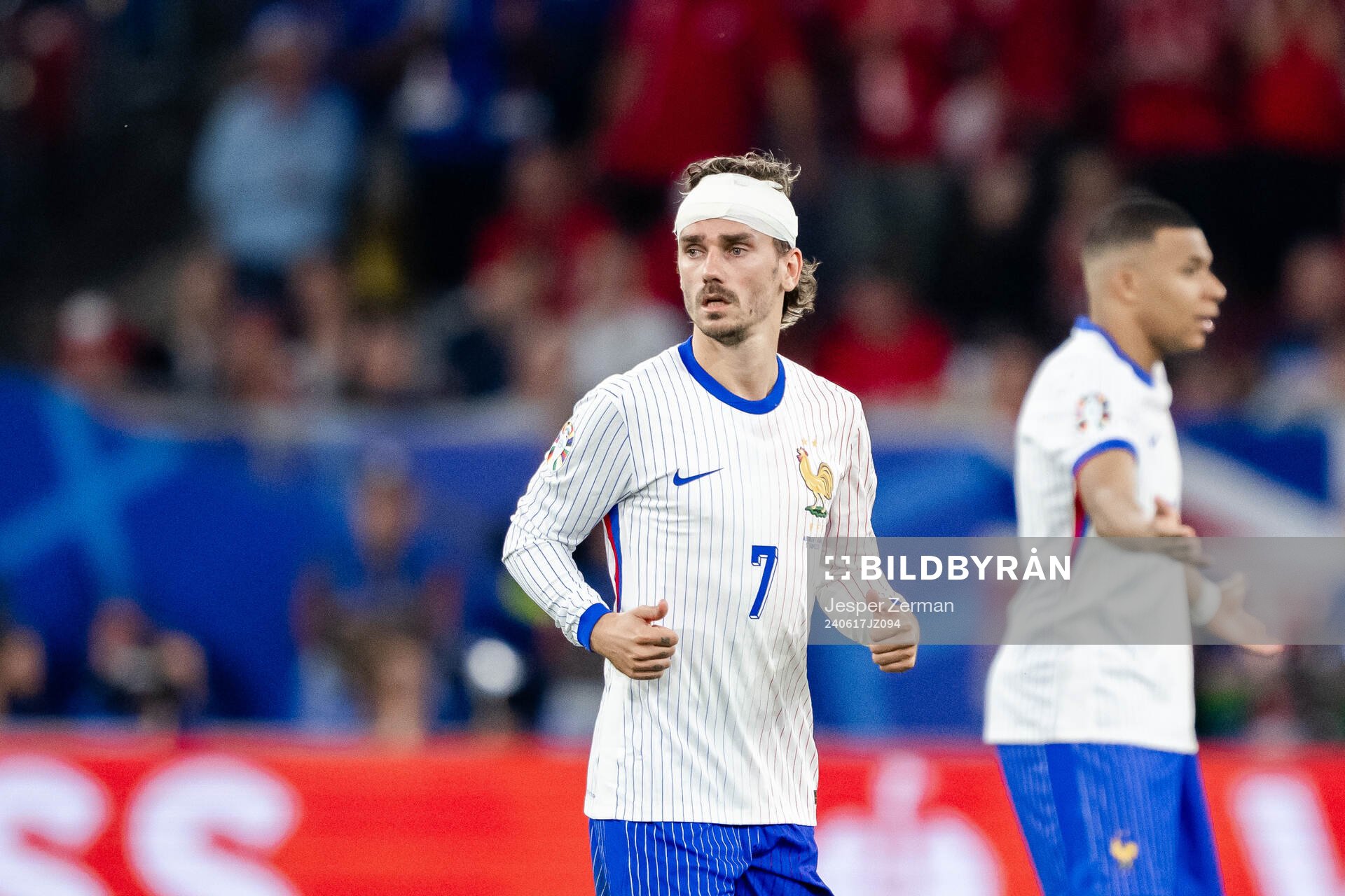 Antoine Griezmann of France in pain