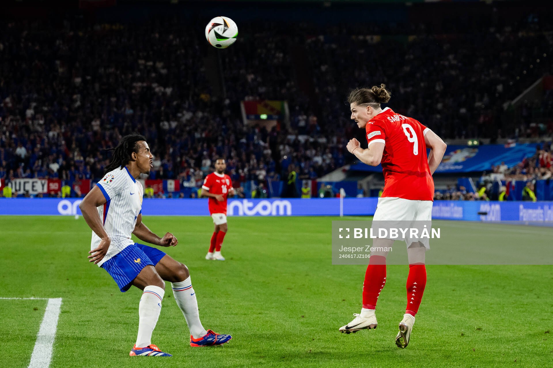 Jules Koundé of France and Marcel Sabitzer of Austria