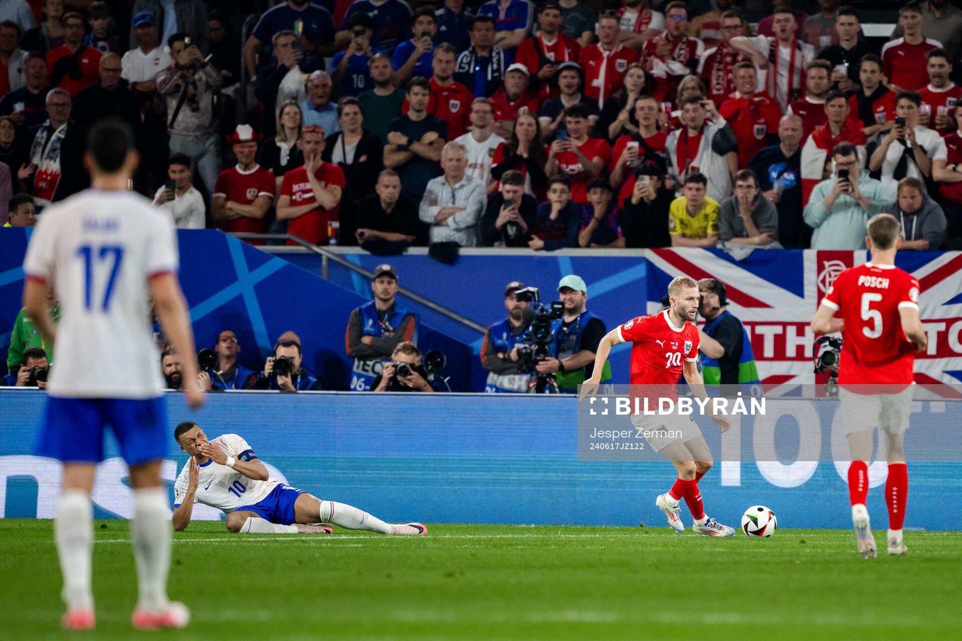 Kylian Mbappé of France and Konrad Laimer of Austria