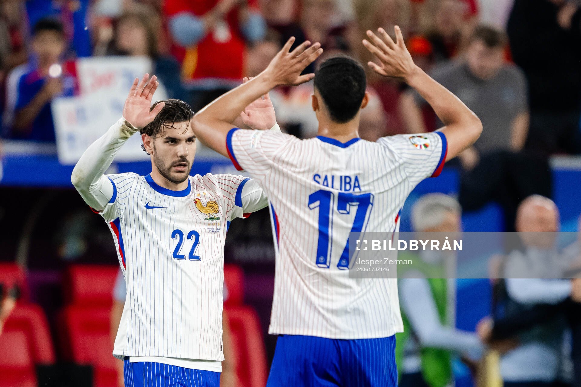 Theo Hernandez and William Saliba of France celebrate
