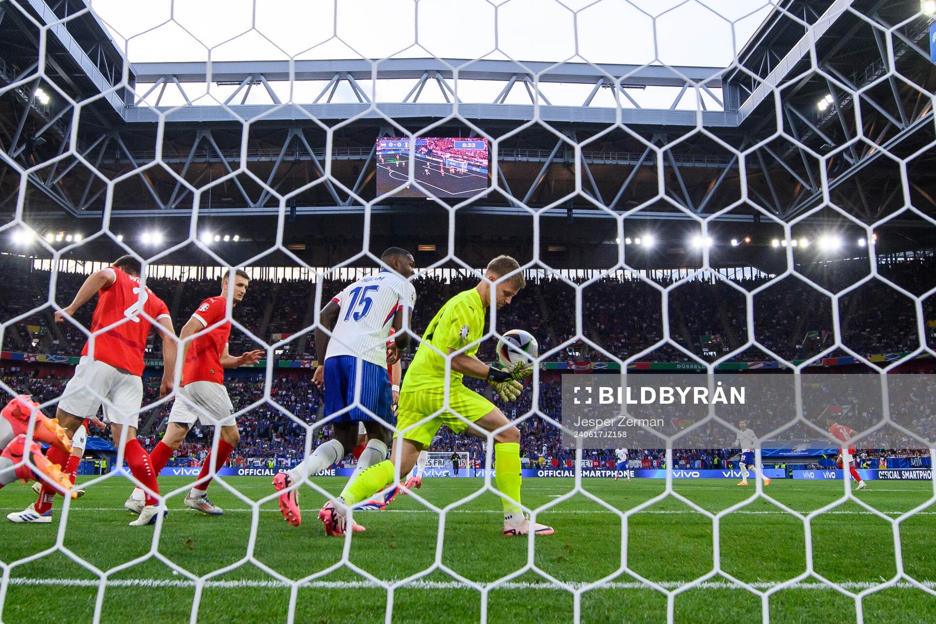 Marcus Thuram of France and goalkeeper Patrick Pentz of Austria during the UEFA Euro 2024 Football Championship match between Austria and France on June 17, 2024 in Düsseldorf.