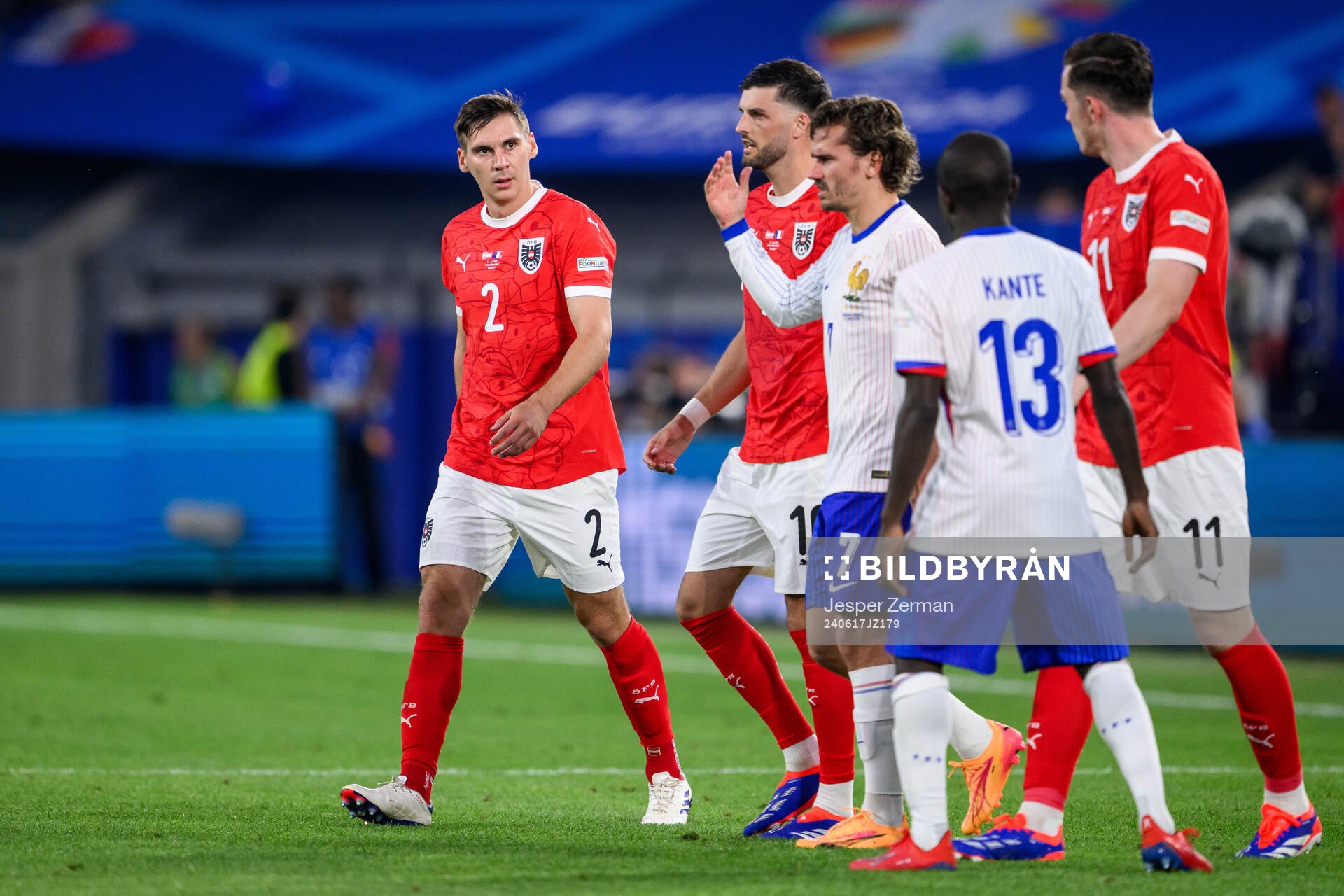 Maximilian Wöber of Austria and Antoine Griezmann of France