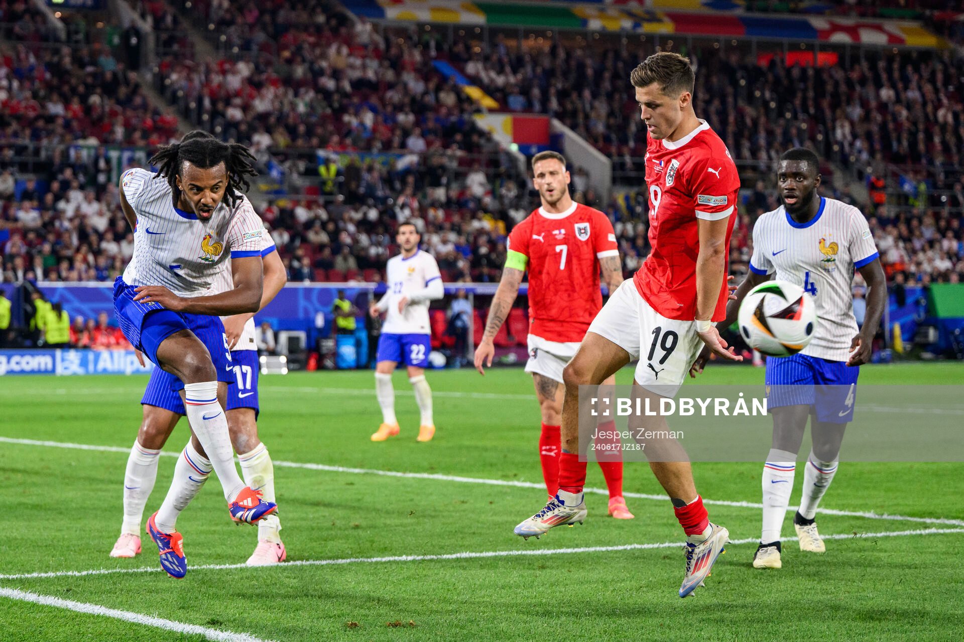 Jules Koundé of France and Christoph Baumgartner of Austria