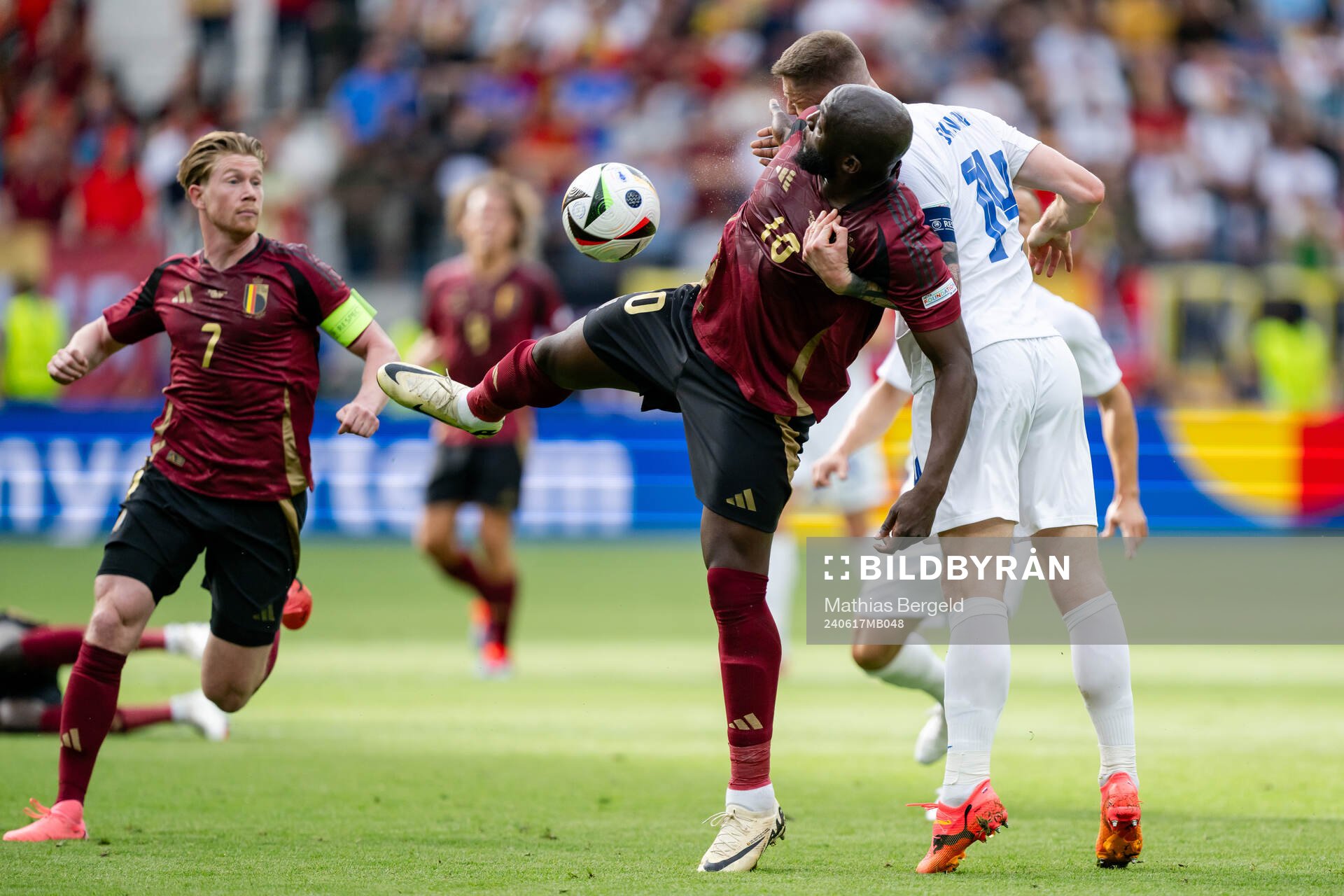 Romelu Lukaku of Belgium and Milan Skriniar of Slovakia