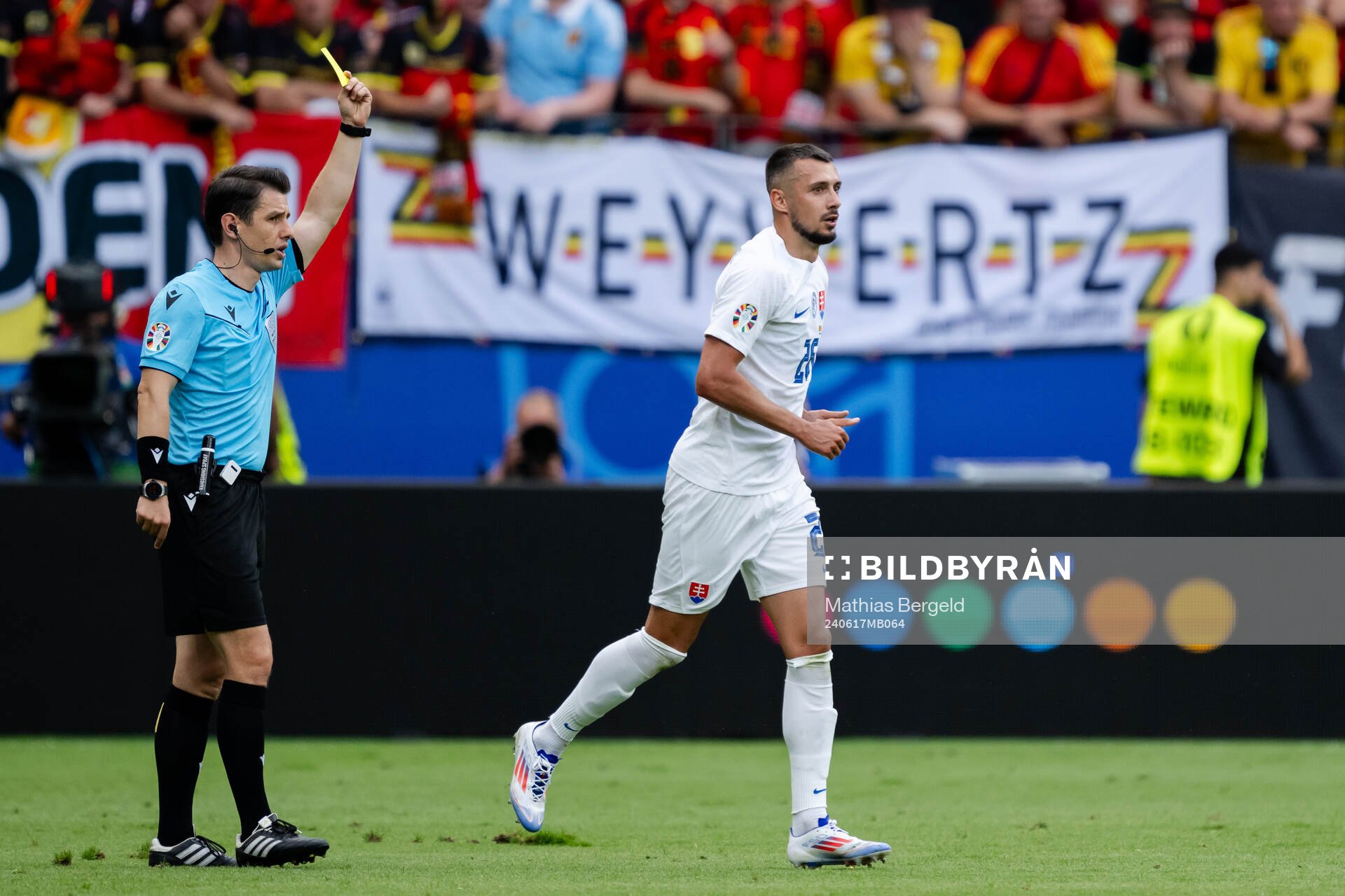 Ivan Schranz of Slovakia receives a yellow card