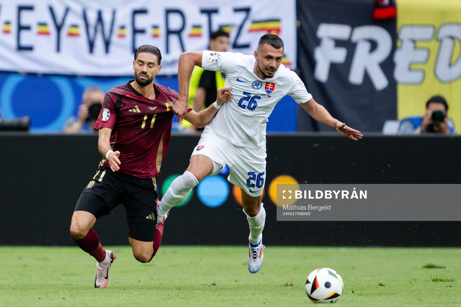 Yannick Carrasco of Belgium and Ivan Schranz of Slovakia