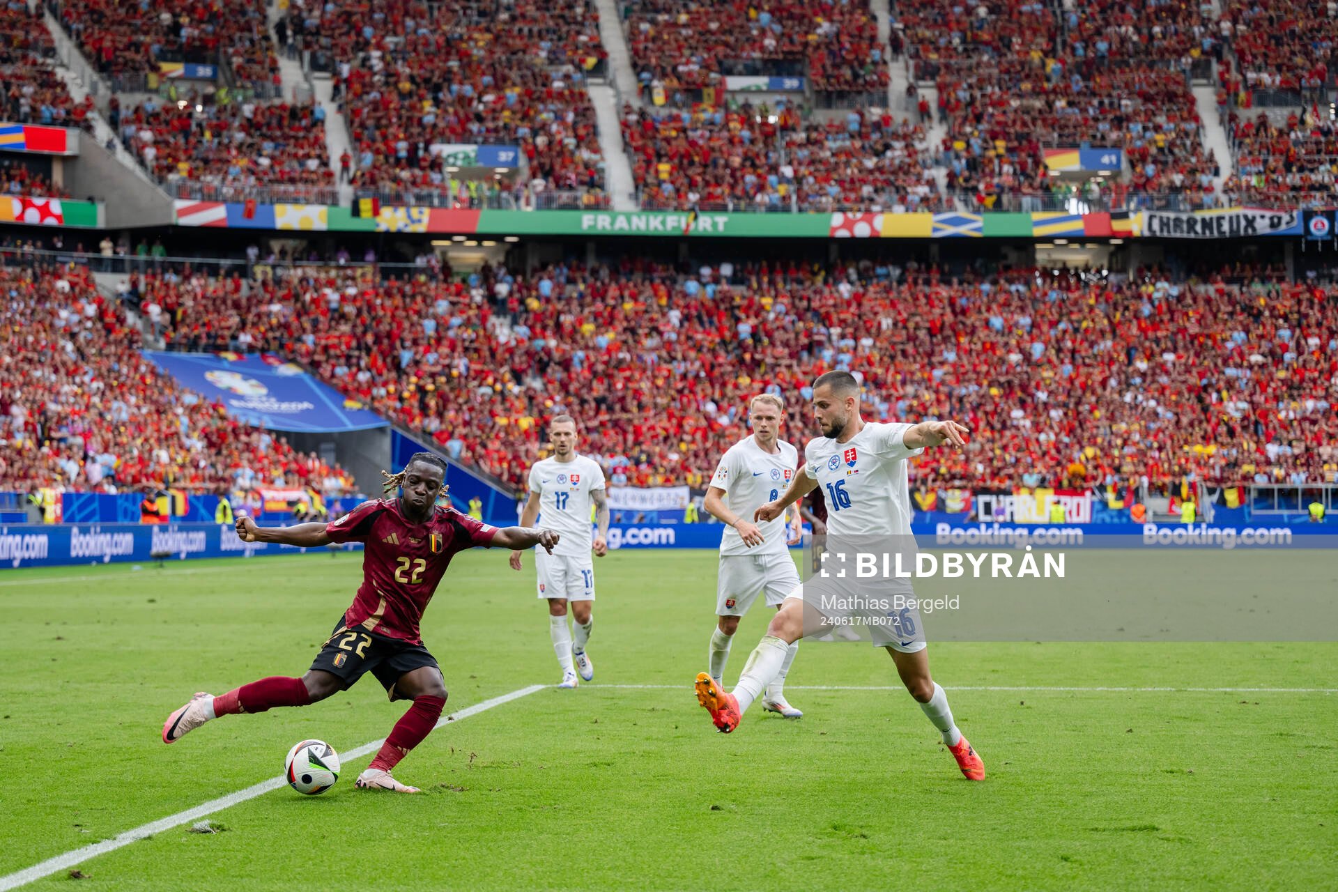 Jeremy Doku of Belgium and David Hancko of Slovakia