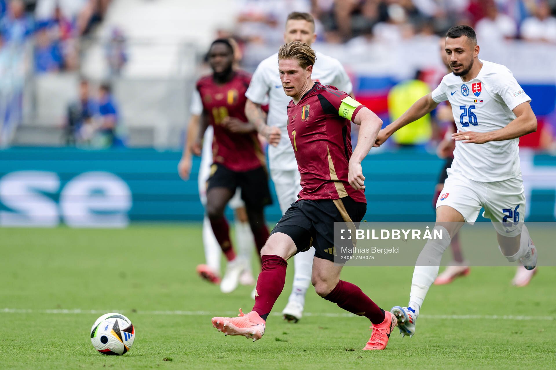 Kevin De Bruyne of Belgium and Ivan Schranz of Slovakia