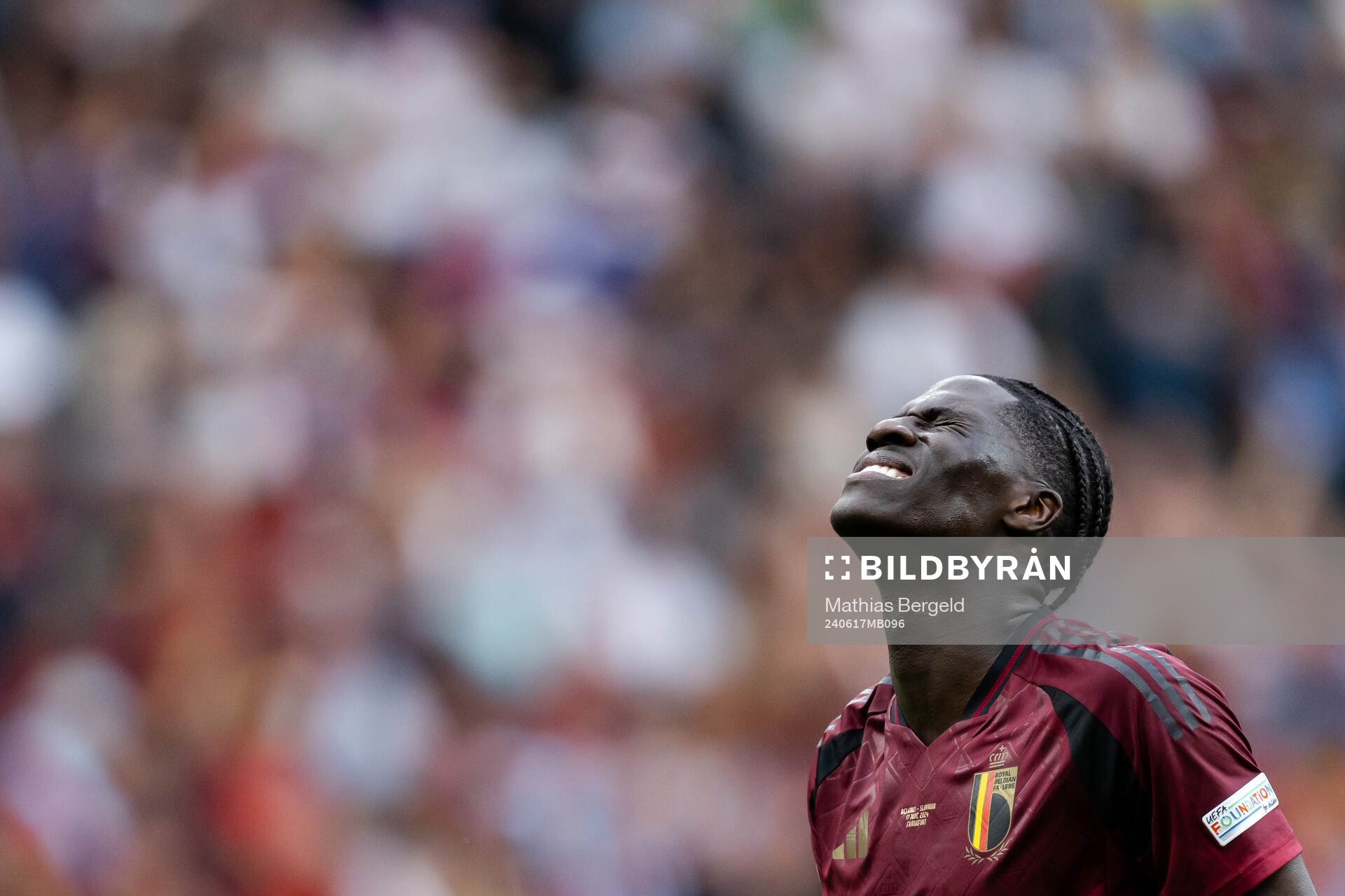 Amadou Onana of Belgium in pain