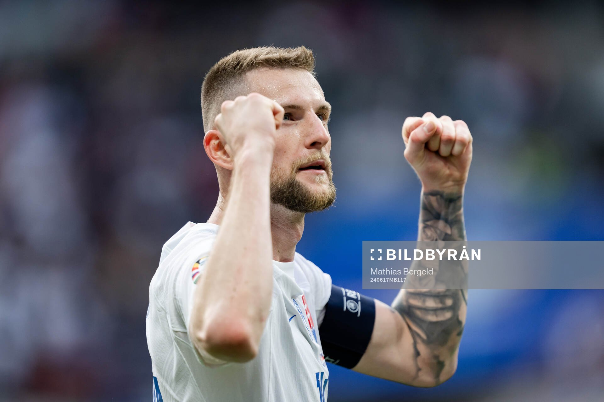 Milan Skriniar of Slovakia celebrates