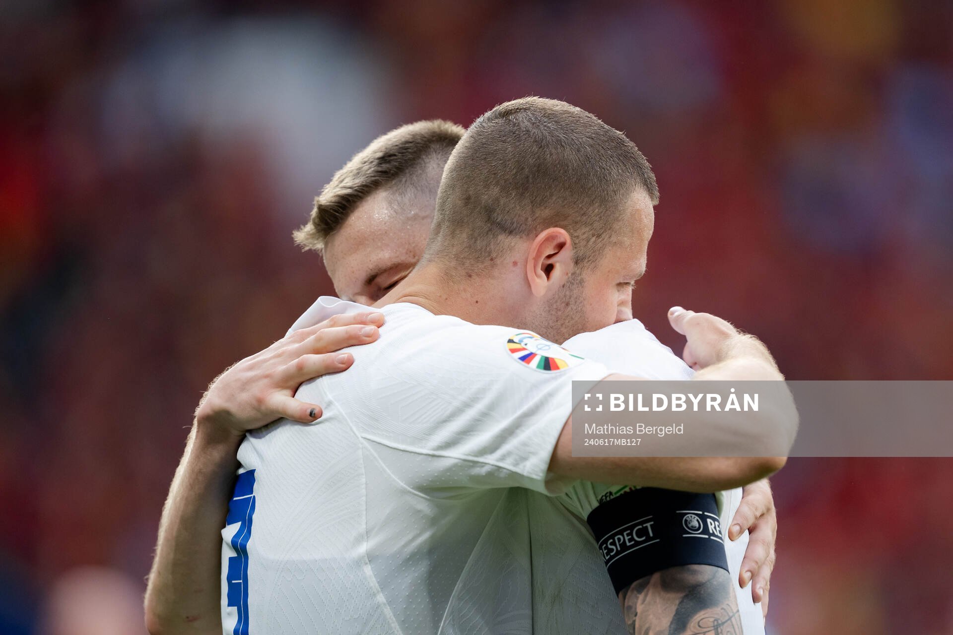 Denis Vavro and Milan Skriniar of Slovakia celebrate