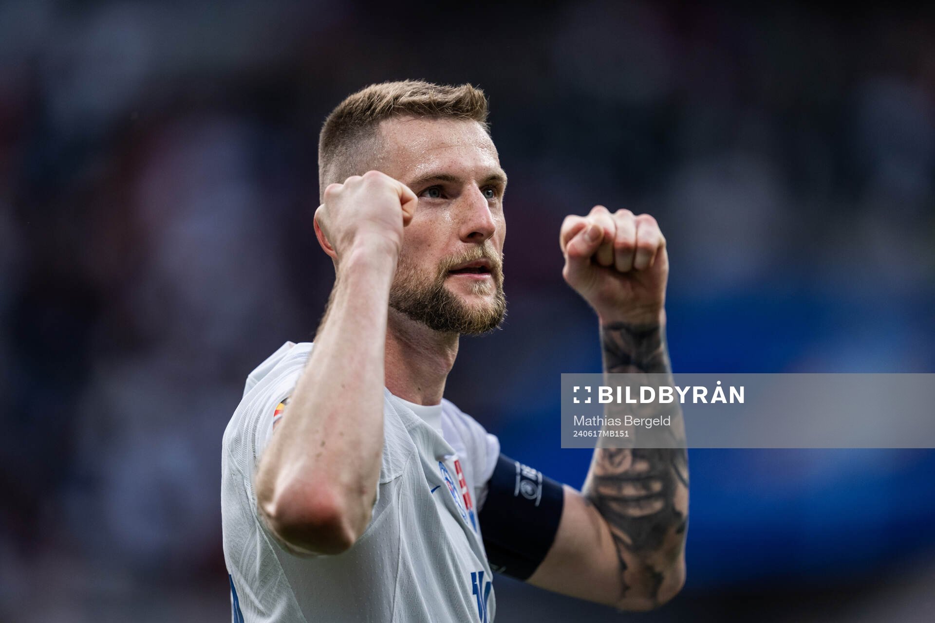 Milan Skriniar of Slovakia celebrates