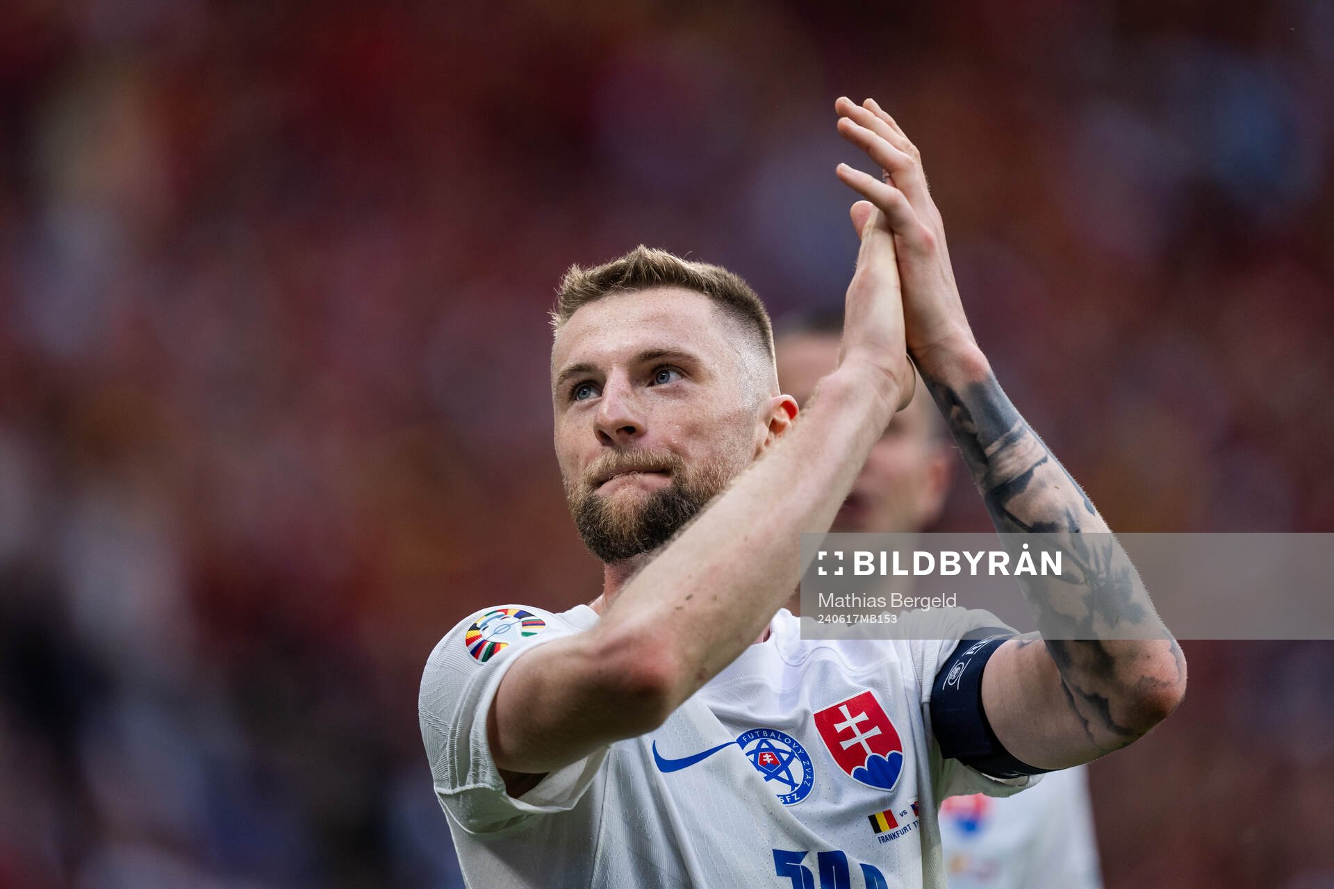 Milan Skriniar of Slovakia celebrates