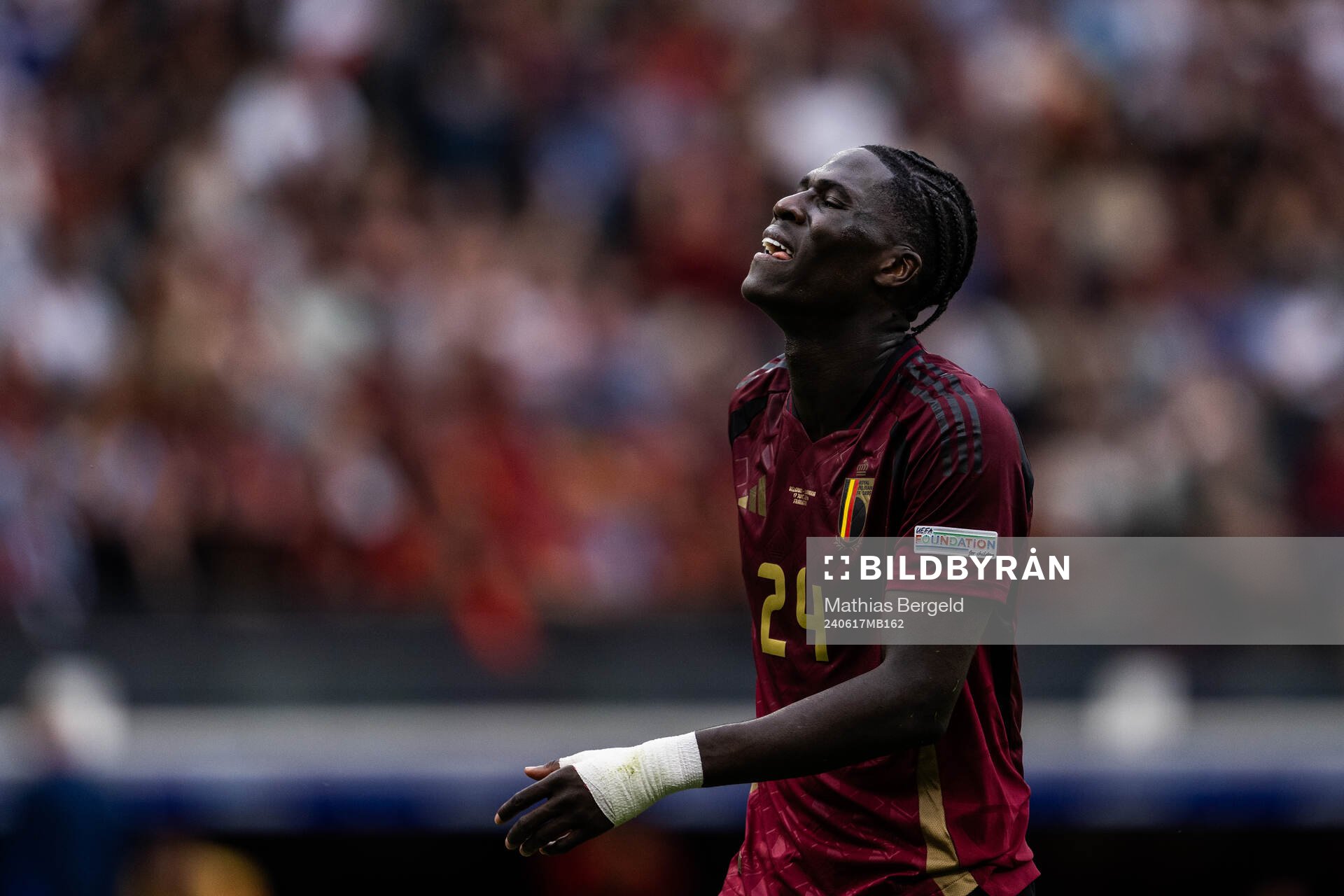Amadou Onana of Belgium looks dejected